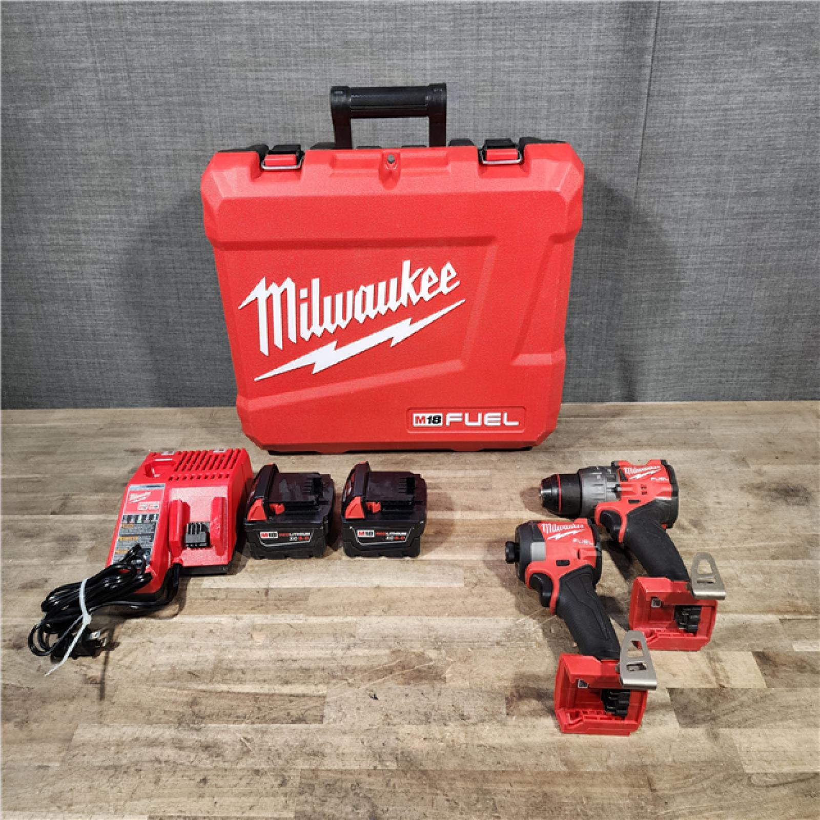 HOUSTON LOCATION - AS-IS Milwaukee FUEL 18V Lithium-Ion Brushless Cordless Hammer Drill and Impact Driver Combo Kit