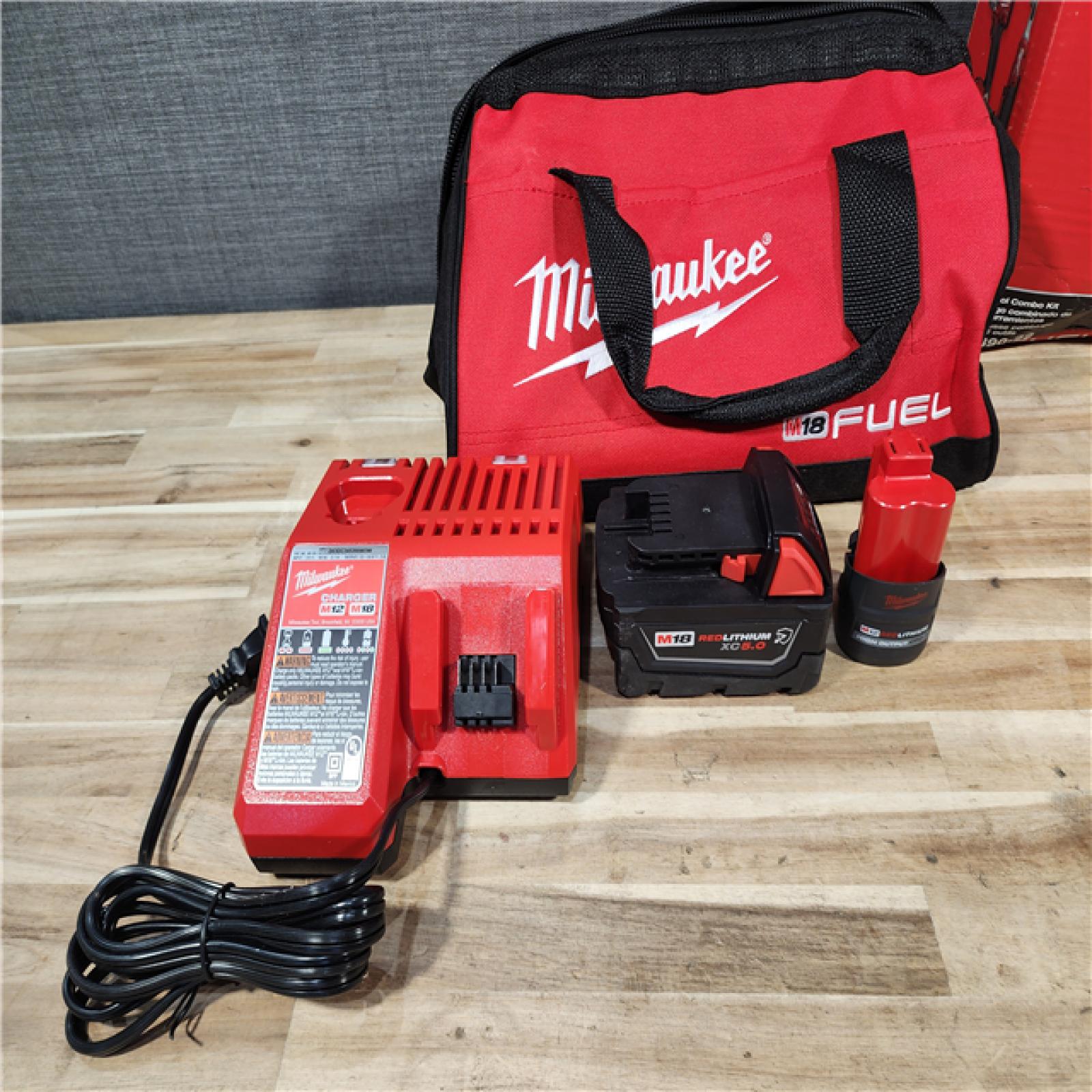 HOUSTON LOCATION - AS-IS Milwaukee FUEL 18V Cordless Mid Torque 1/2 in. Impact Wrench w/ M12 FUEL 3/8 in. Ratchet & Battery/Charger Combo Kit