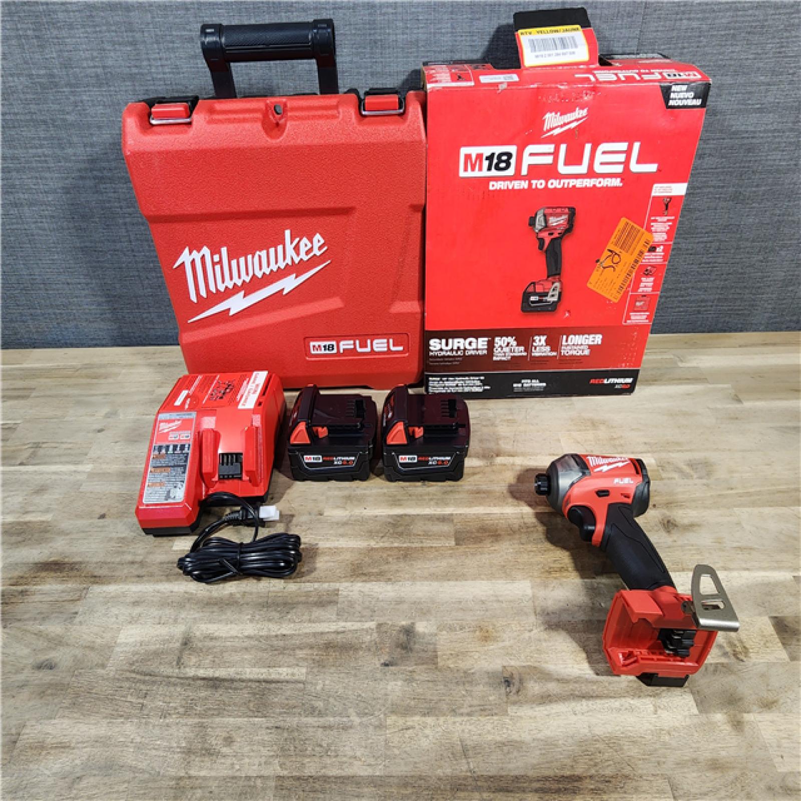 HOUSTON LOCATION - AS-IS (APPEARS LIKE NEW) Milwaukee M18 FUEL SURGE 18-Volt Lithium-Ion Brushless Cordless 1/4 in. Hex Impact Driver Compact Kit with Two 5.0 Ah Batteries
