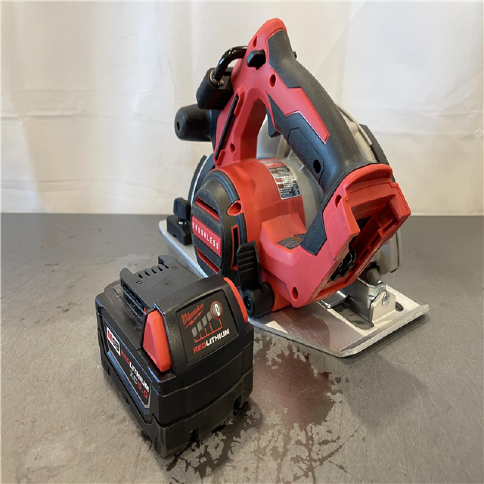 AS-IS - Milwaukee M18 18V Lithium-Ion Brushless Cordless 7-1/4 in. Circular Saw with 5.0Ah Battery