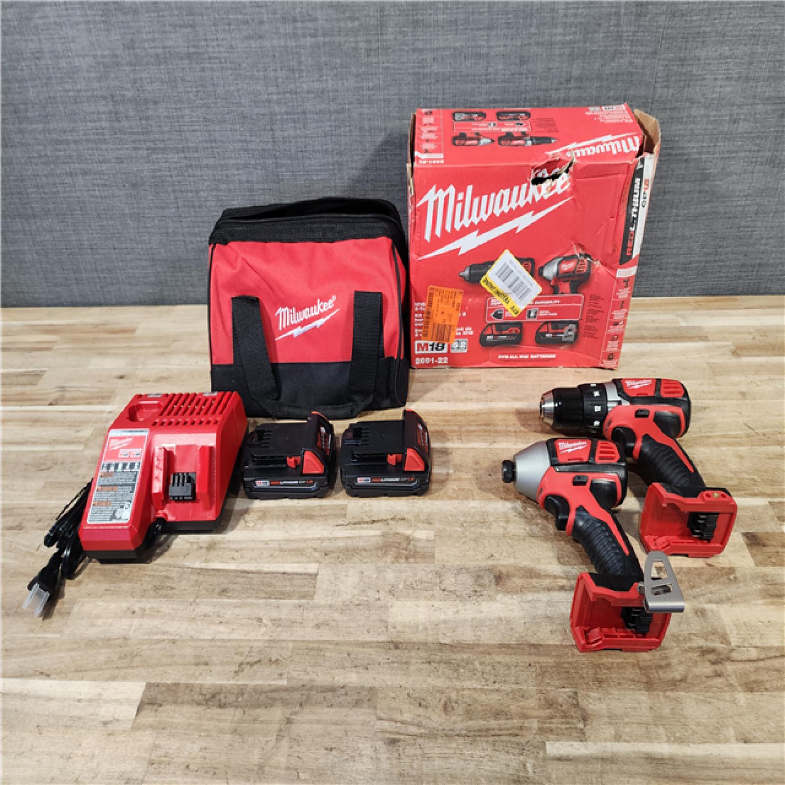 HOUSTON LOCATION - AS-IS Milwaukee 18V Lithium-Ion Cordless Drill Driver/Impact Driver Combo Kit