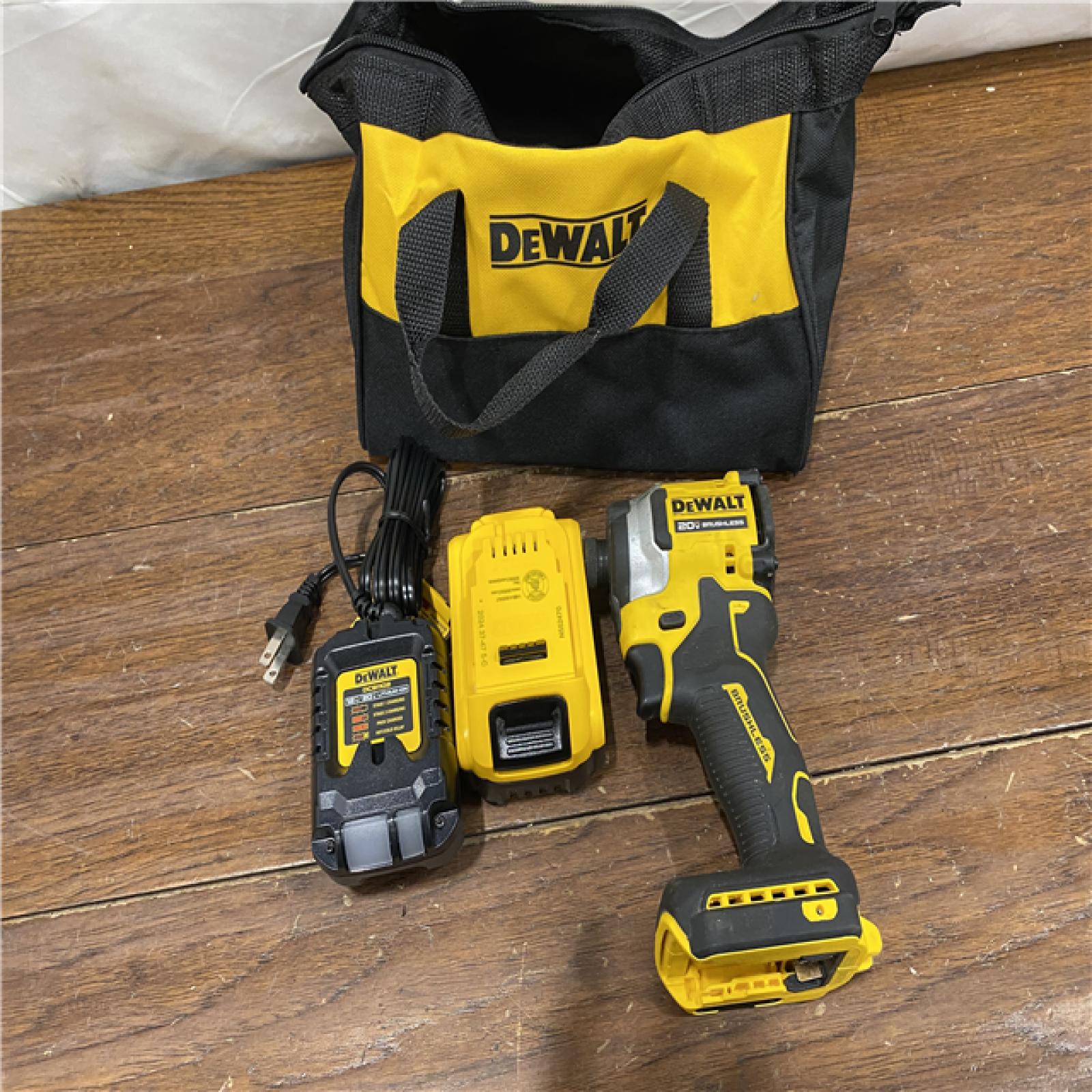 AS-IS DEWALT ATOMIC 20V MAX Lithium-Ion Cordless 1/4 in. Brushless Impact Driver Kit, 5 Ah Battery, Charger, and Bag