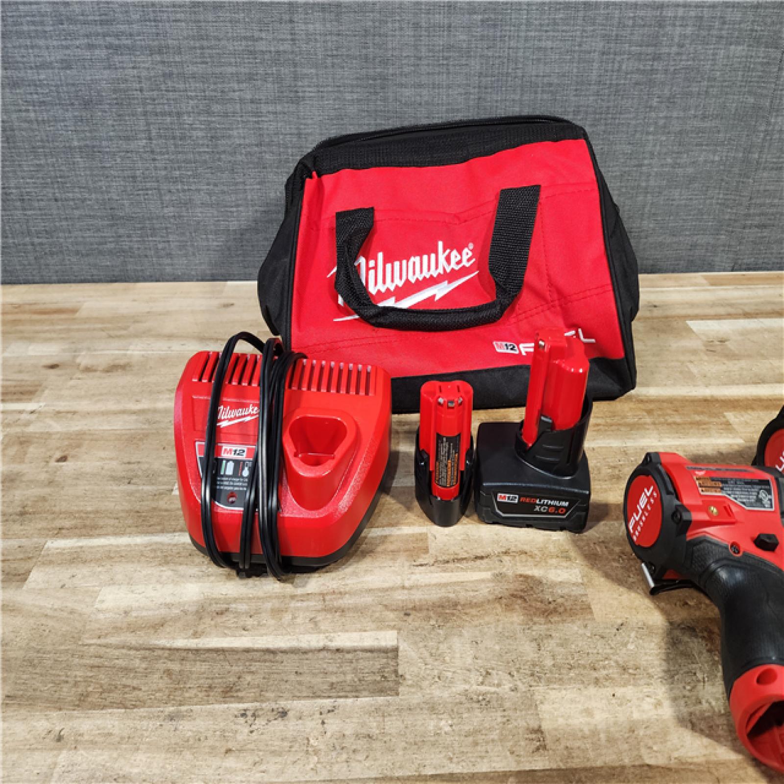 HOUSTON LOCATION - AS - IS Milwaukee FUEL 12-Volt Lithium-Ion Brushless Cordless Hammer Drill and Impact Driver Combo Kit