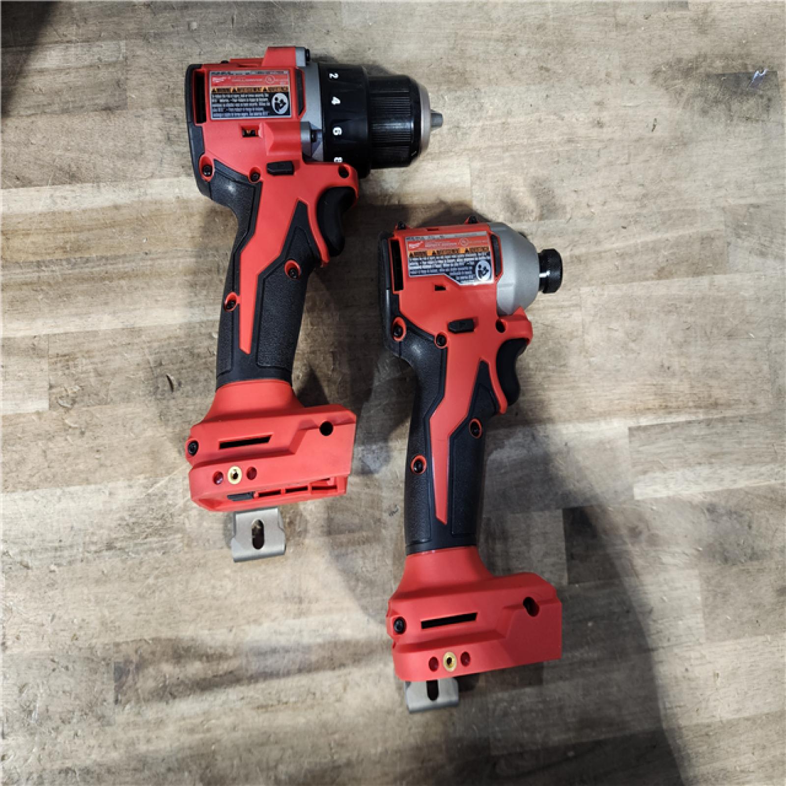 HOUSTON LOCATION - AS-IS Milwaukee M18 18V Lithium-Ion Brushless Cordless Compact Drill/Impact Combo Kit (2-Tool) W/(2) 2.0 Ah Batteries  Charger & Bag