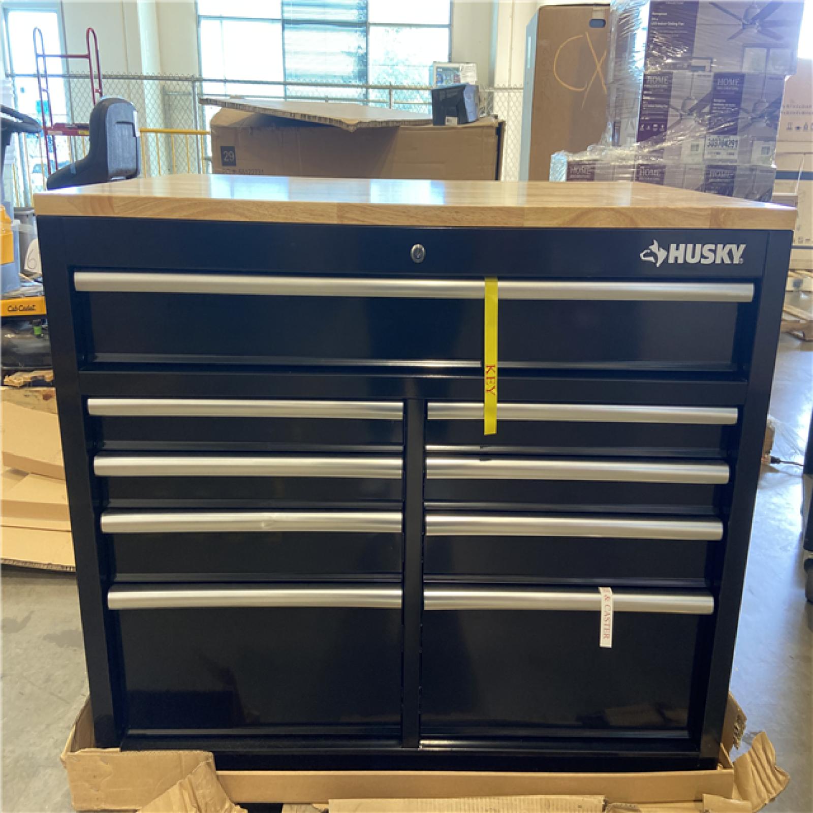 DALLAS LOCATION - Husky Tool Storage 46 in. W x 51 in. D Standard Duty Black Mobile Workbench Cabinet with Solid Top Full Length Extension Table