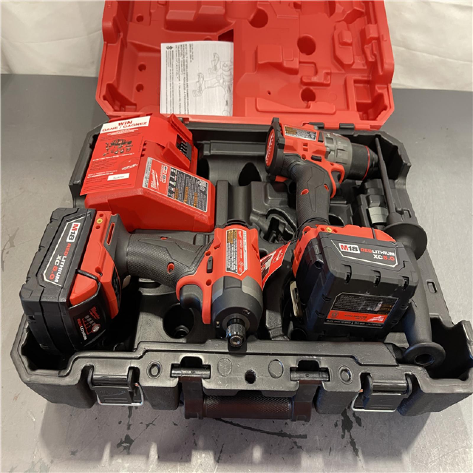 AS-IS - Milwaukee M18 FUEL 18V Lithium-Ion Brushless Cordless Hammer Drill and Impact Driver Combo Kit