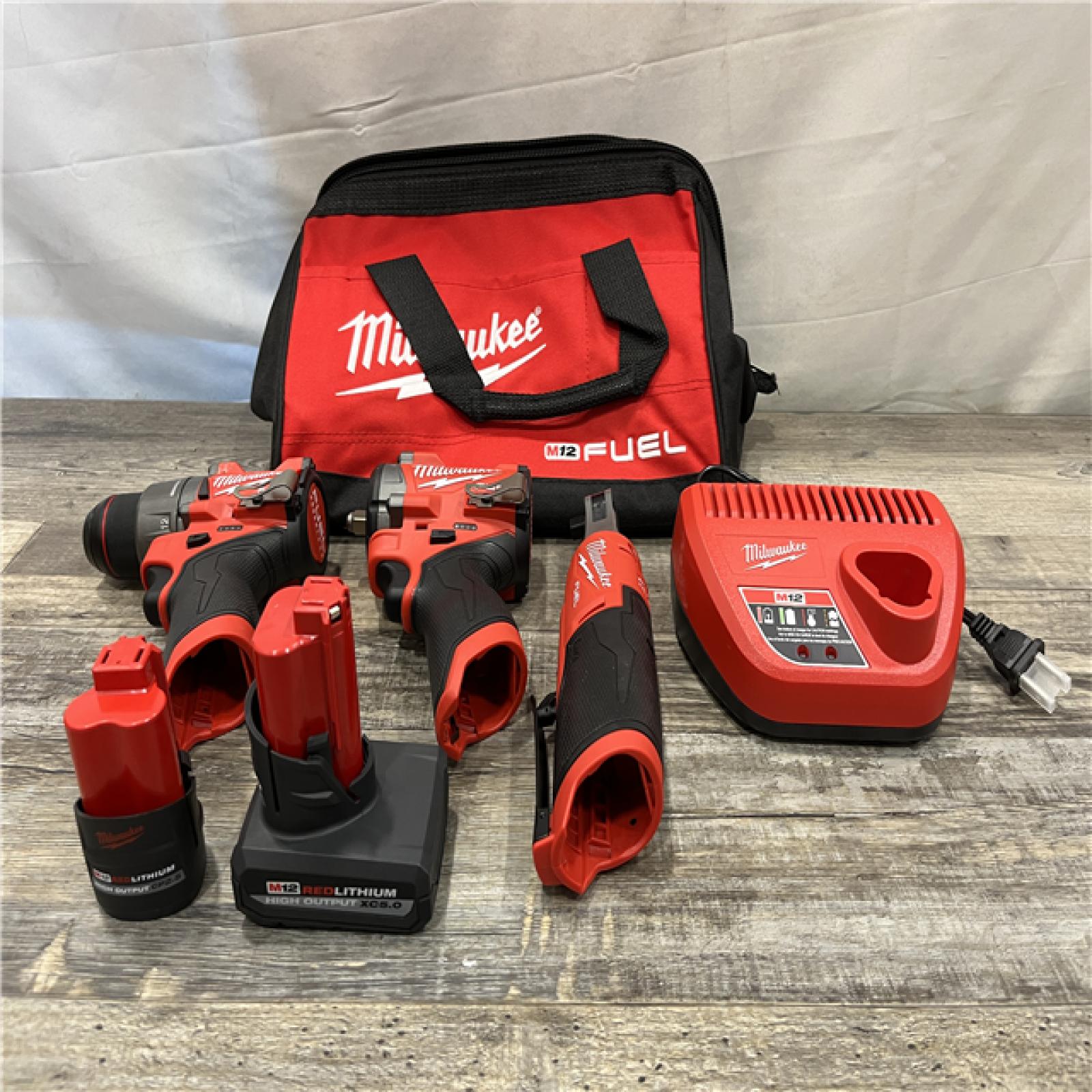 AS-IS Milwaukee FUEL 12V Lithium-Ion Cordless Drill Driver  Impact Wrench  and Ratchet Combo Kit