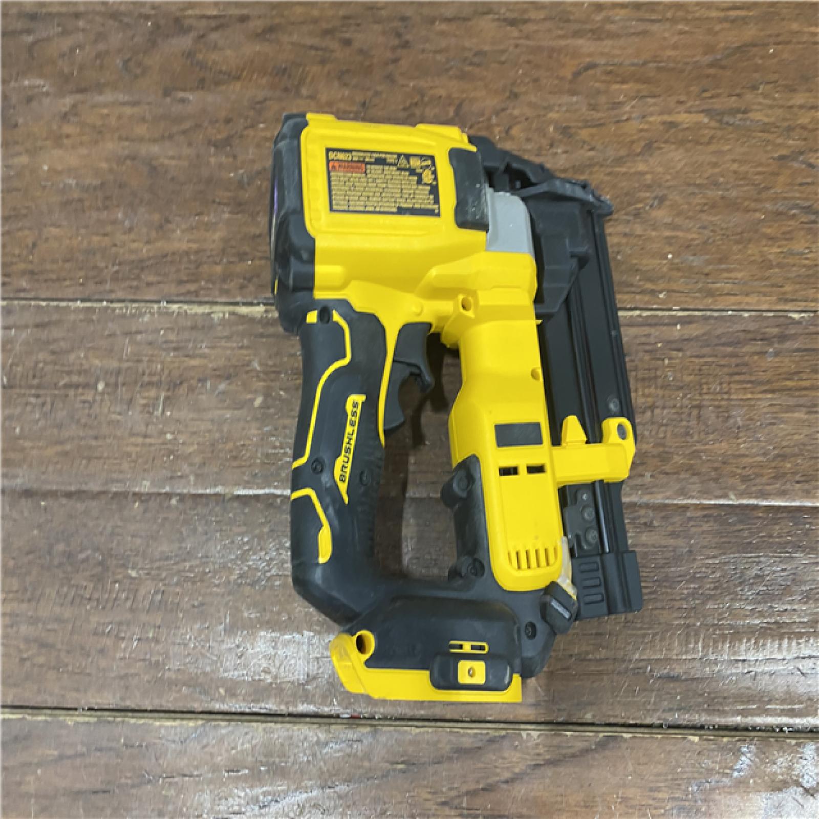 AS-IS DEWALT ATOMIC 20V MAX Lithium Ion Cordless 23 Gauge Pin Nailer Kit with 3.0Ah Battery and Charger