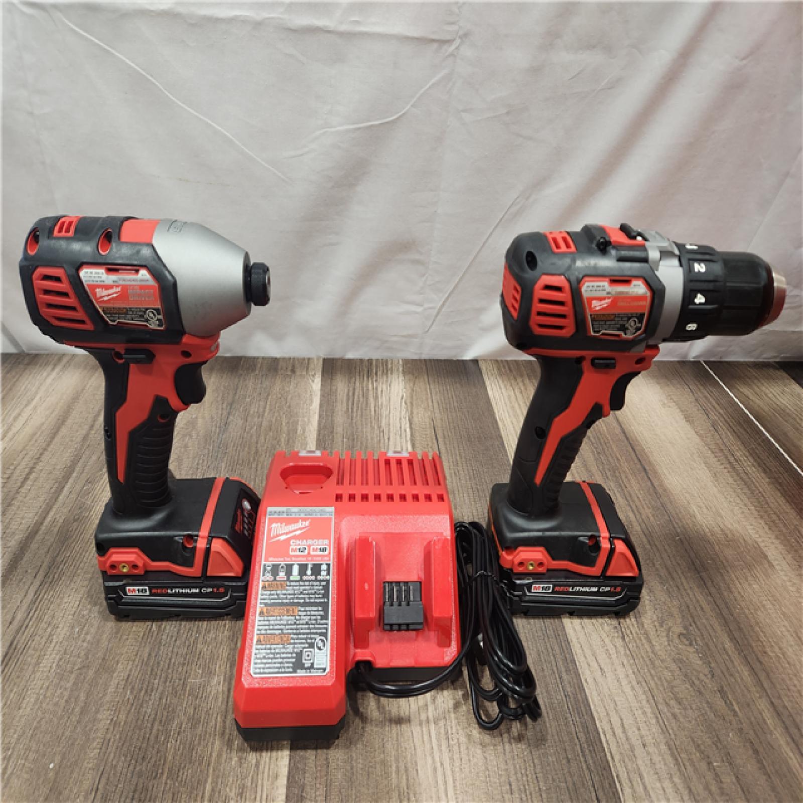 AS-IS- Milwaukee 18V Cordless Brushed 2-Tool Drill/Driver and Impact Driver Kit
