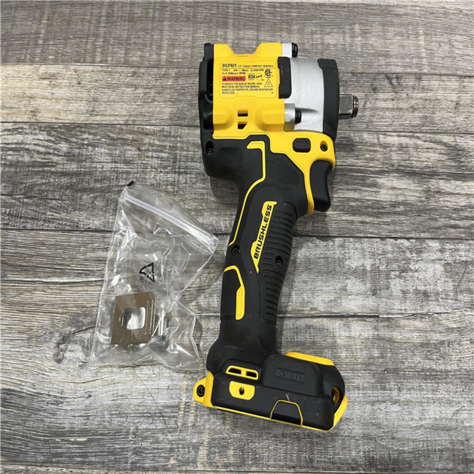 AS-IS DEWALT ATOMIC 20V MAX Cordless Brushless 1/2 in. Variable Speed Impact Wrench (Tool Only)