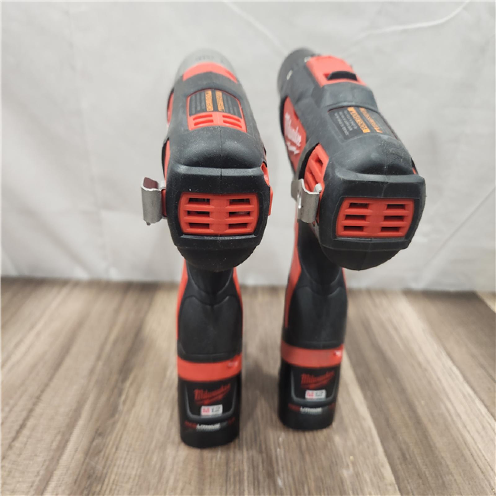 AS-IS- Milwaukee M12 Cordless Combination 3/8  Drill / Driver and 1/4  Hex Impact Driver Dual Power Tool Kit (2 Lithium Ion Batteries  Charger  and B