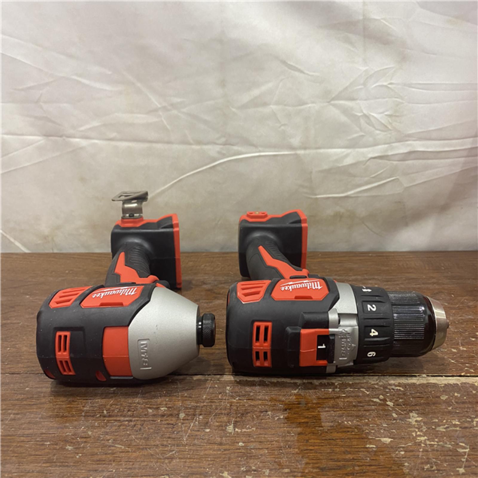 AS-IS  Milwaukee 18V Cordless Brushed 2 Tool Drill/Driver and Impact Driver Kit