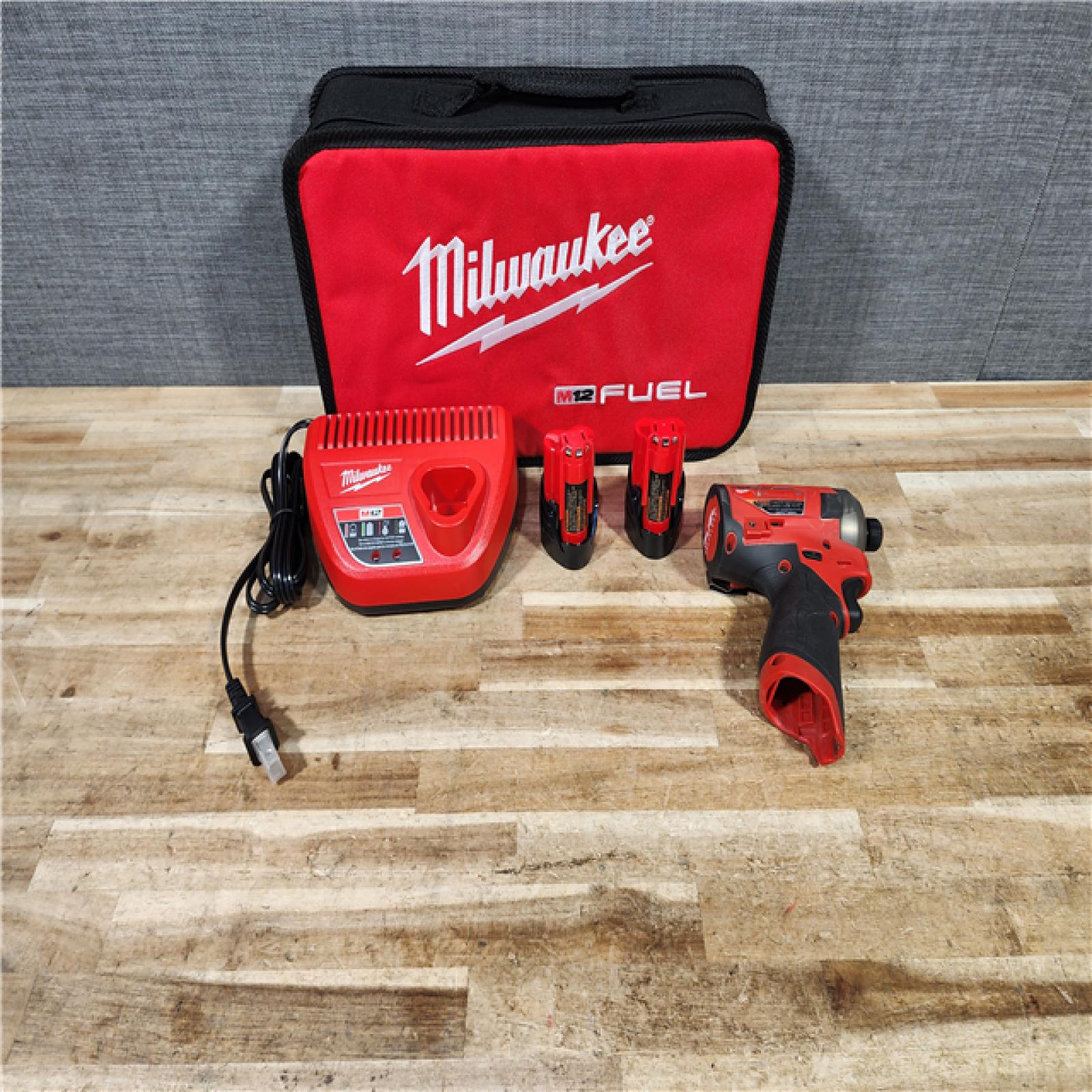HOUSTON LOCATION - AS - IS Milwaukee FUEL SURGE 12V Lithium-Ion Brushless Cordless 1/4 in. Hex Impact Driver Compact Kit