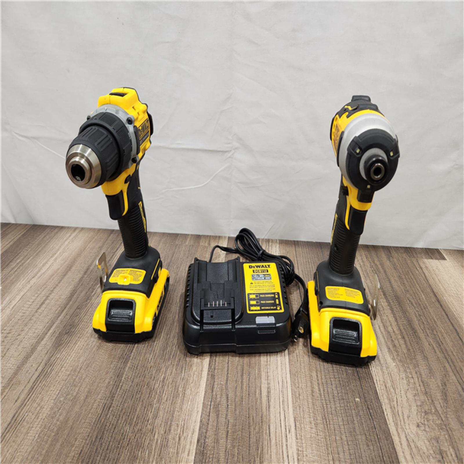 AS-IS Dewalt 20V MAX ATOMIC Brushless Compact Lithium-Ion 1/2 in. Cordless Drill Driver and 1/4 in. Impact Driver Combo Kit with 2 Batteries 2 Ah
