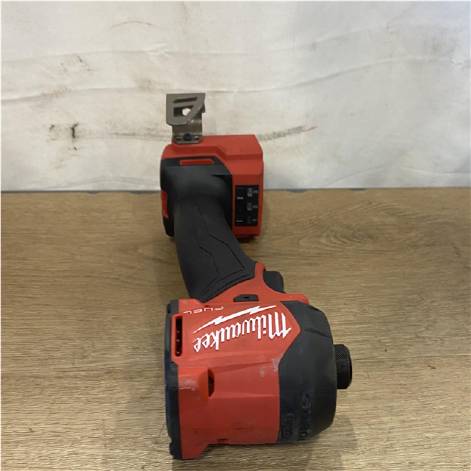 AS-IS  Milwaukee FUEL SURGE 18V Lithium-Ion Brushless Cordless 1/4 in. Hex Impact Driver (Tool-Only)