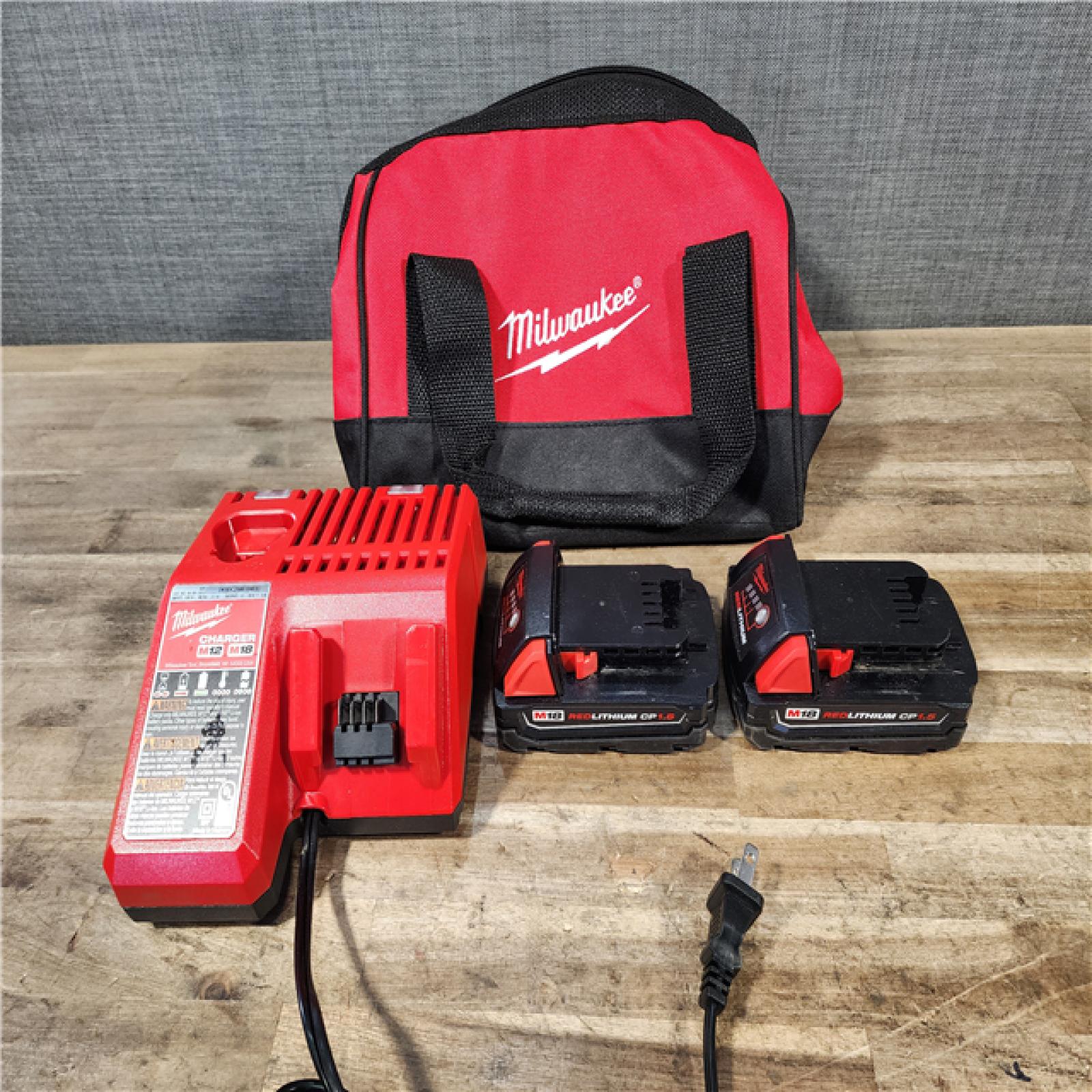 HOUSTON LOCATION - AS-IS Milwaukee 18V Lithium-Ion Cordless Drill Driver/Impact Driver Combo Kit