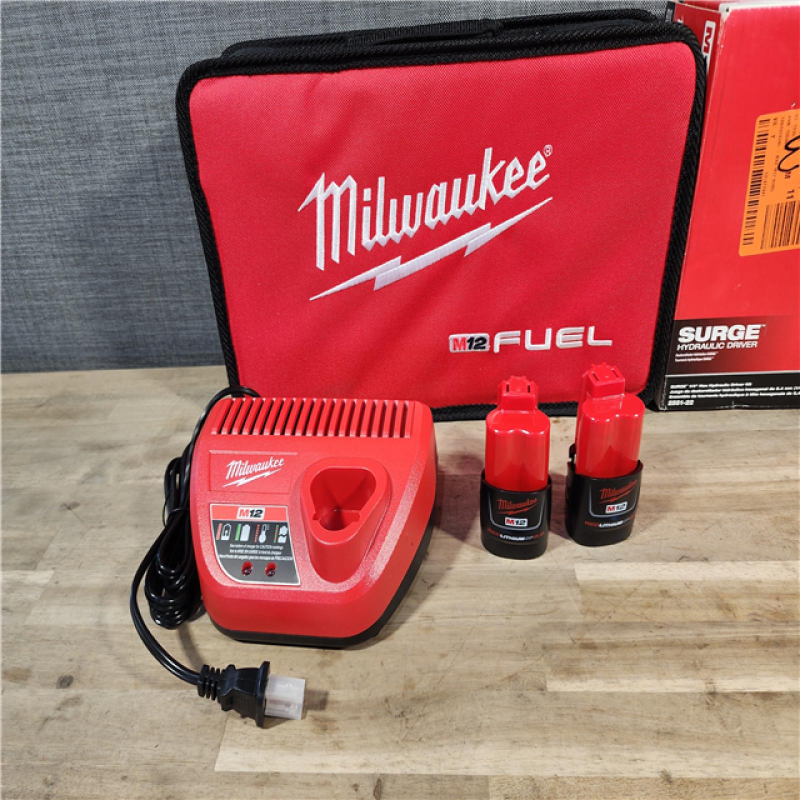 HOUSTON LOCATION - AS-IS Milwaukee M12 FUEL SURGE 12V Lithium-Ion Brushless Cordless 1/4 in. Hex Impact Driver Compact Kit W/Two 2.0Ah Batteries, Bag