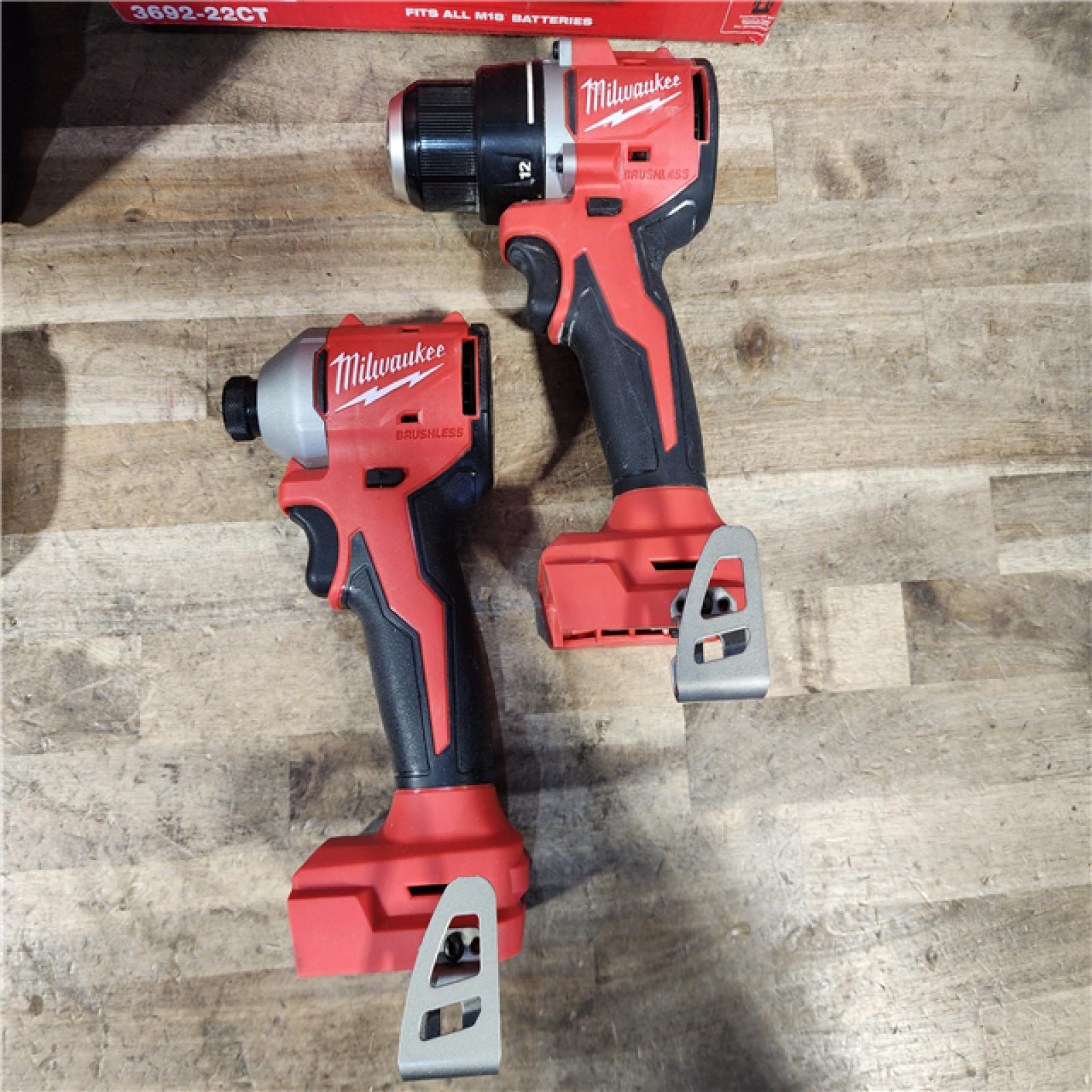 HOUSTON LOCATION - AS-IS Milwaukee M18 18V Lithium-Ion Brushless Cordless Compact Drill/Impact Combo Kit (2-Tool) W/(2) 2.0 Ah Batteries  Charger & Bag