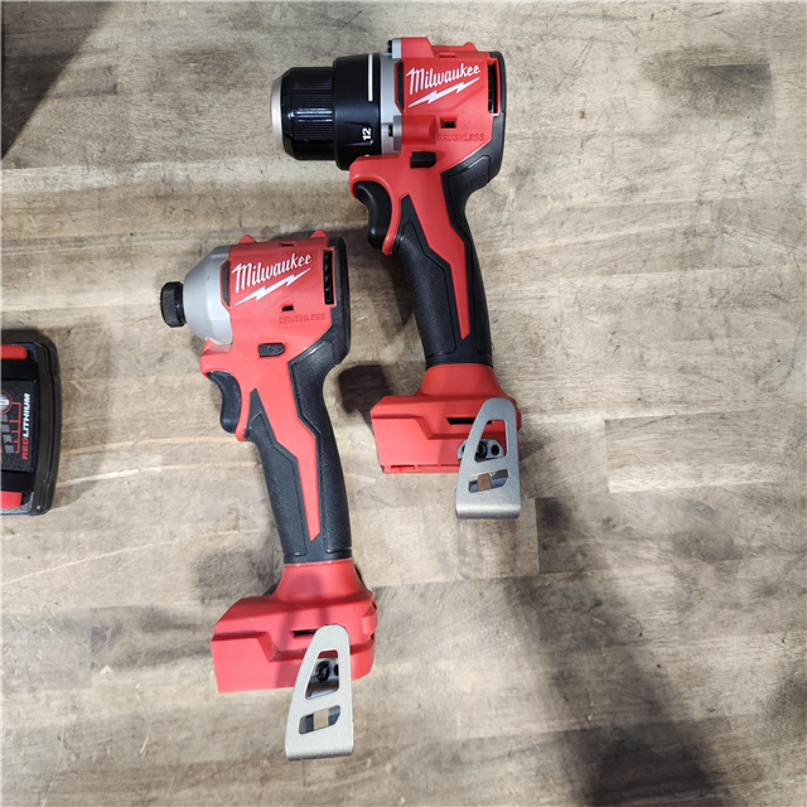HOUSTON LOCATION - AS-IS Milwaukee M18 18V Lithium-Ion Brushless Cordless Compact Drill/Impact Combo Kit (2-Tool) W/(2) 2.0 Ah Batteries  Charger & Bag