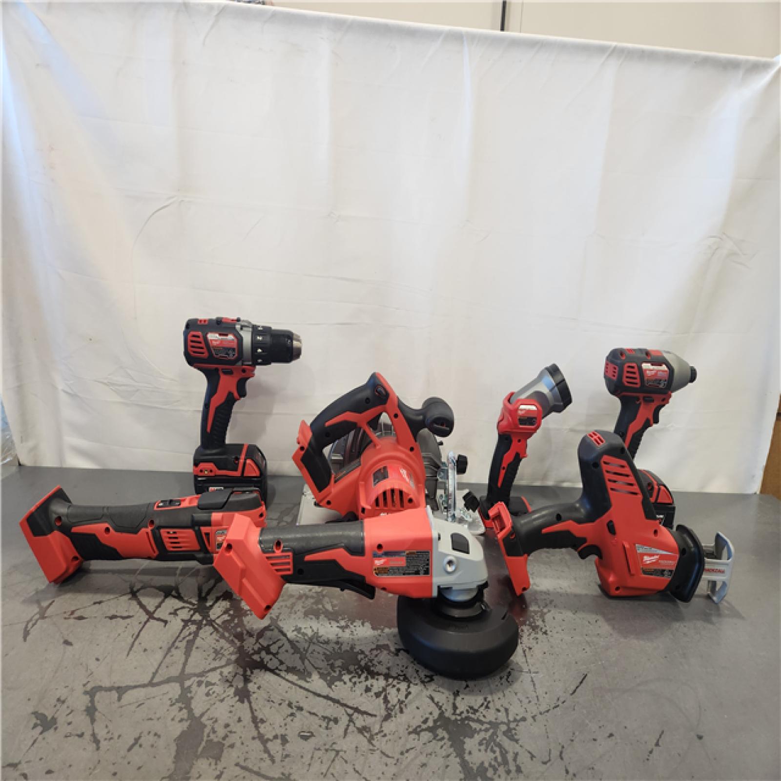 AS-IS- M18 18-Volt Lithium-Ion Cordless Combo Kit 7-Tool with 2-Batteries  Charger and Tool Bag