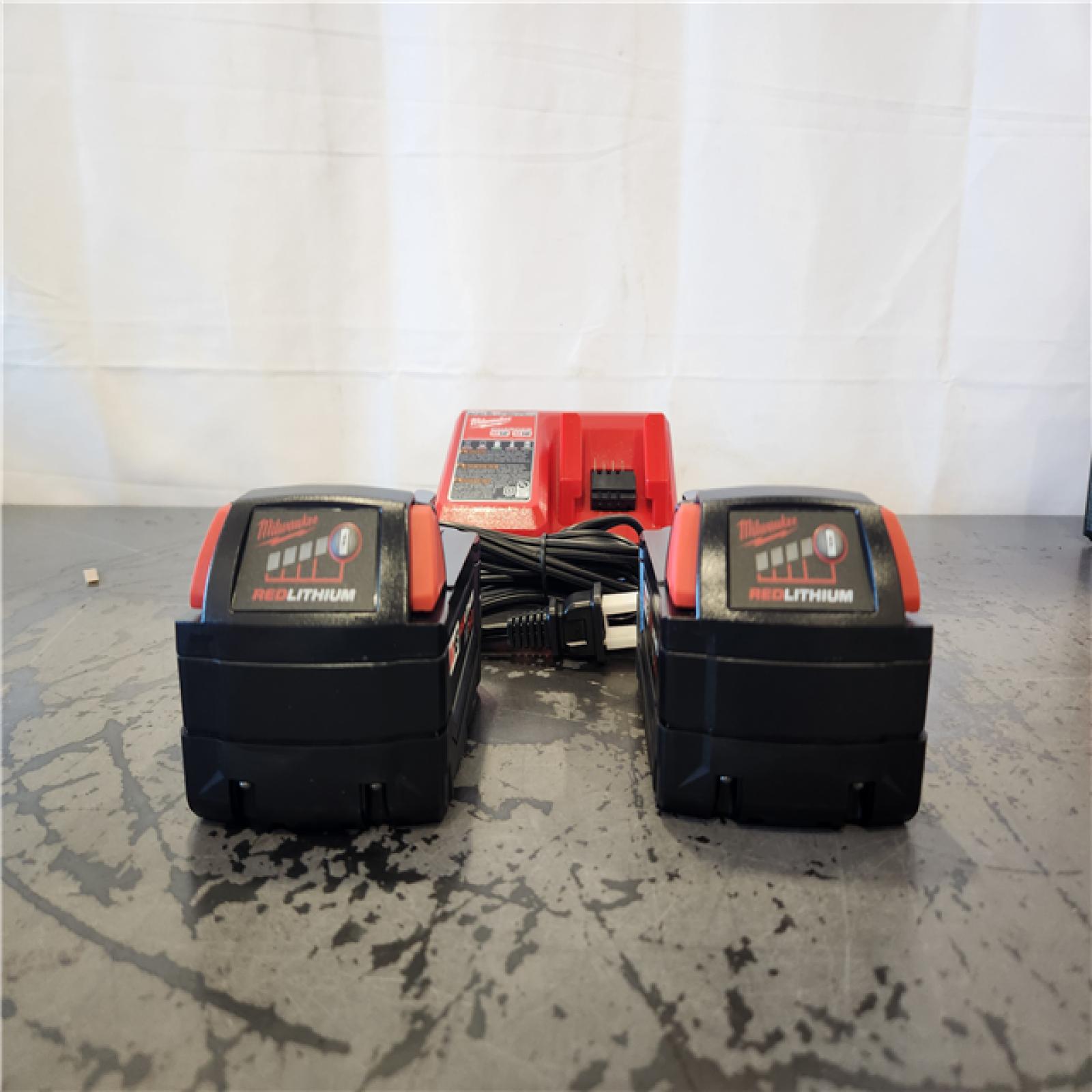 AS-IS- Milwaukee 18-Volt Lithium-Ion XC Starter Kit with Two 5.0Ah Batteries and Charger
