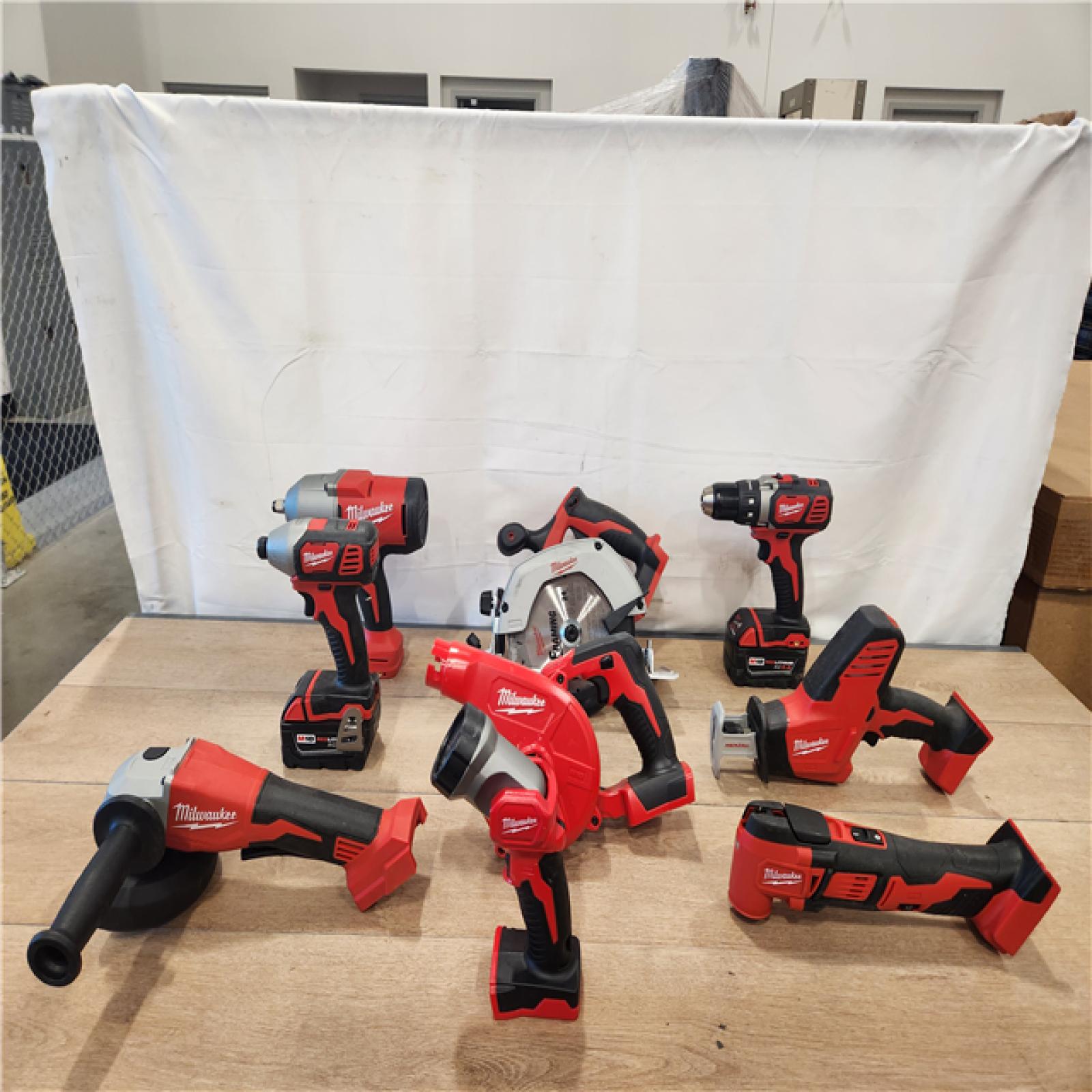 AS-IS- M18 18-Volt Lithium-Ion Cordless Combo Kit 9-Tool with 2-Batteries  Charger and Tool Bag