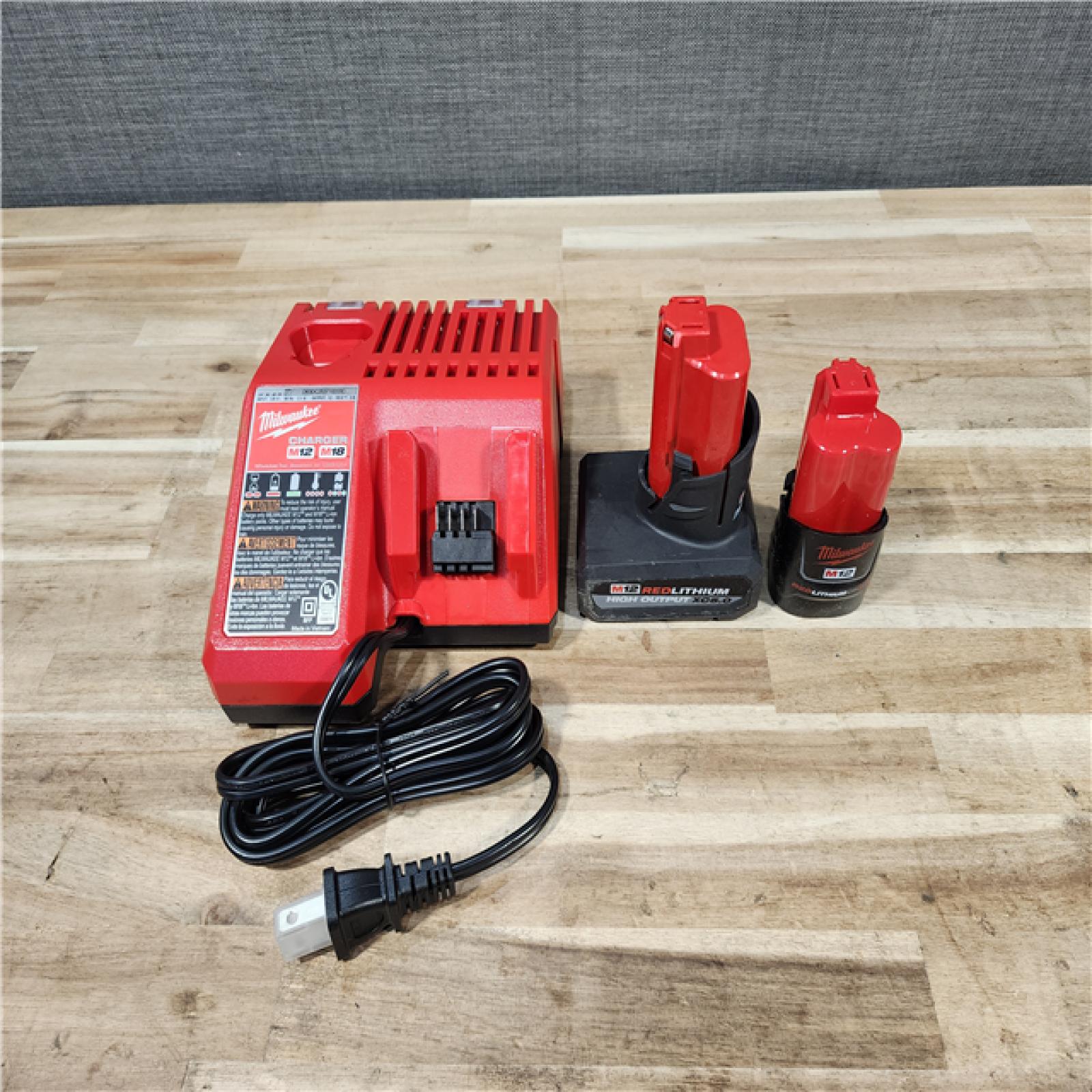 HOUSTON LOCATION - AS-IS MILWAUKEE 3 TOOL COMBO KIT W/ (2) BATTERY & CHARGER
