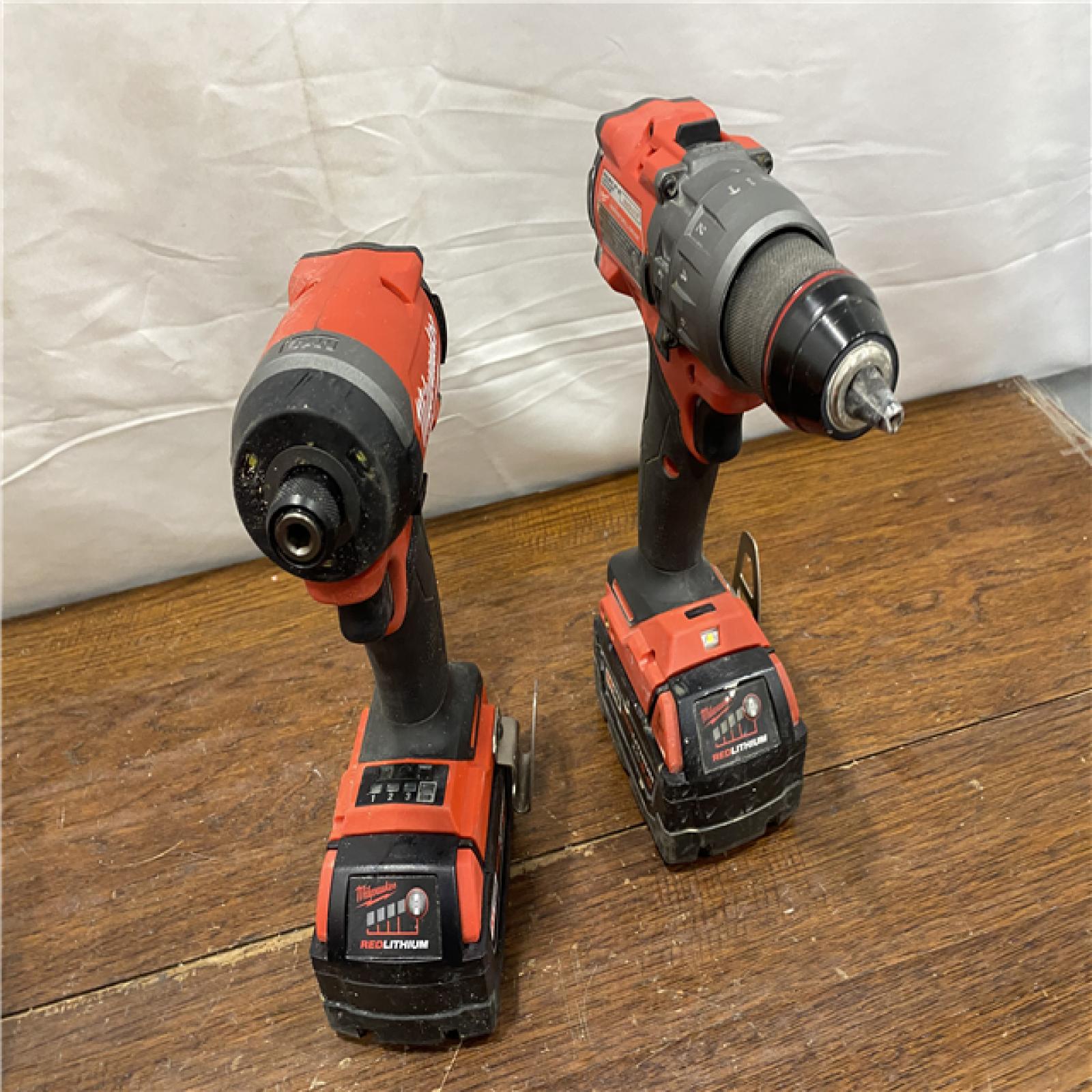 AS-IS M18 FUEL 18V Lithium-Ion Brushless Cordless Hammer Drill and Impact Driver Combo Kit (2-Tool) with 2 Batteries