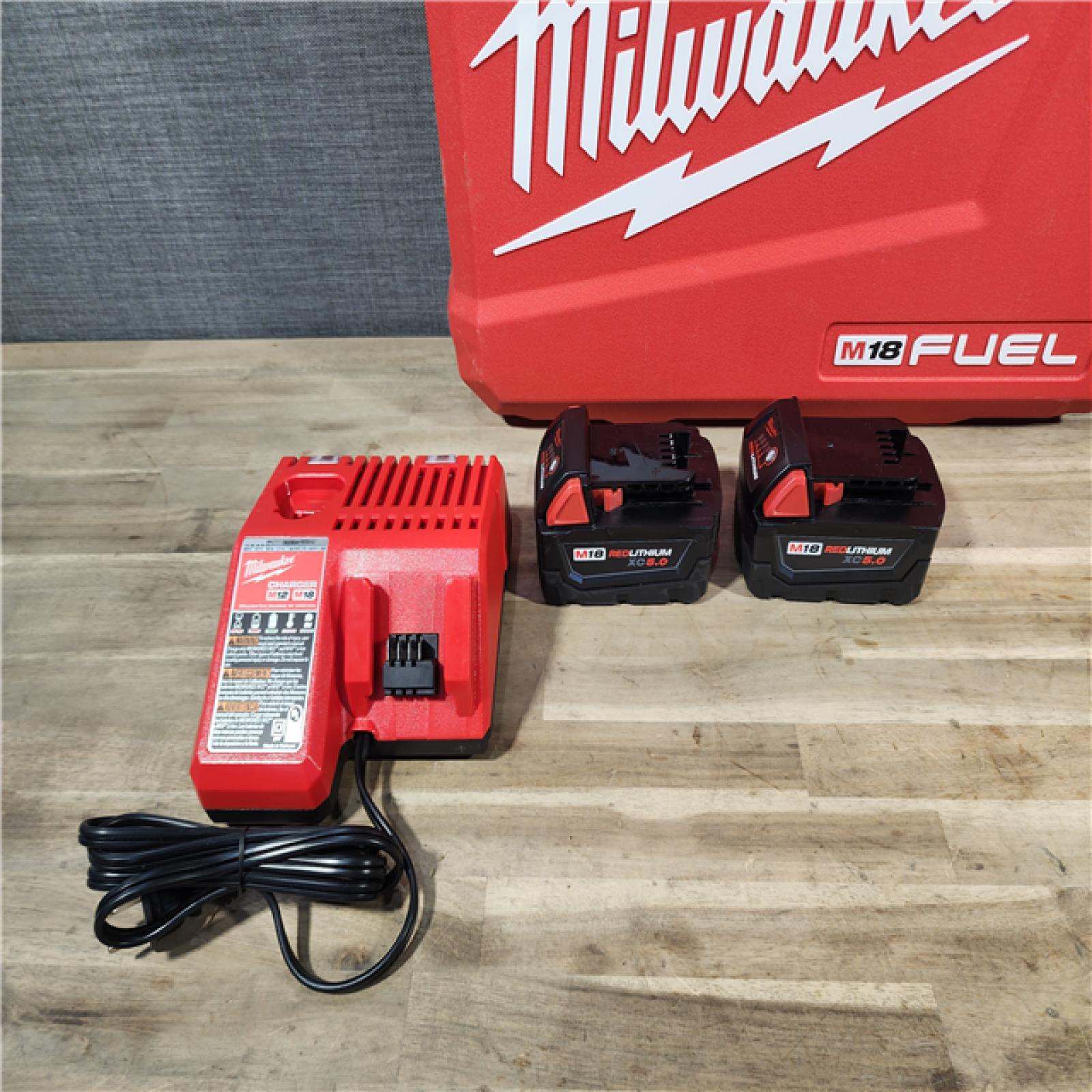 HOUSTON LOCATION - AS-IS MILWAUKEE FUEL 18V Lithium-Ion Brushless Cordless Hammer Drill and Impact Driver Combo Kit (2-Tool) with 2 Batteries