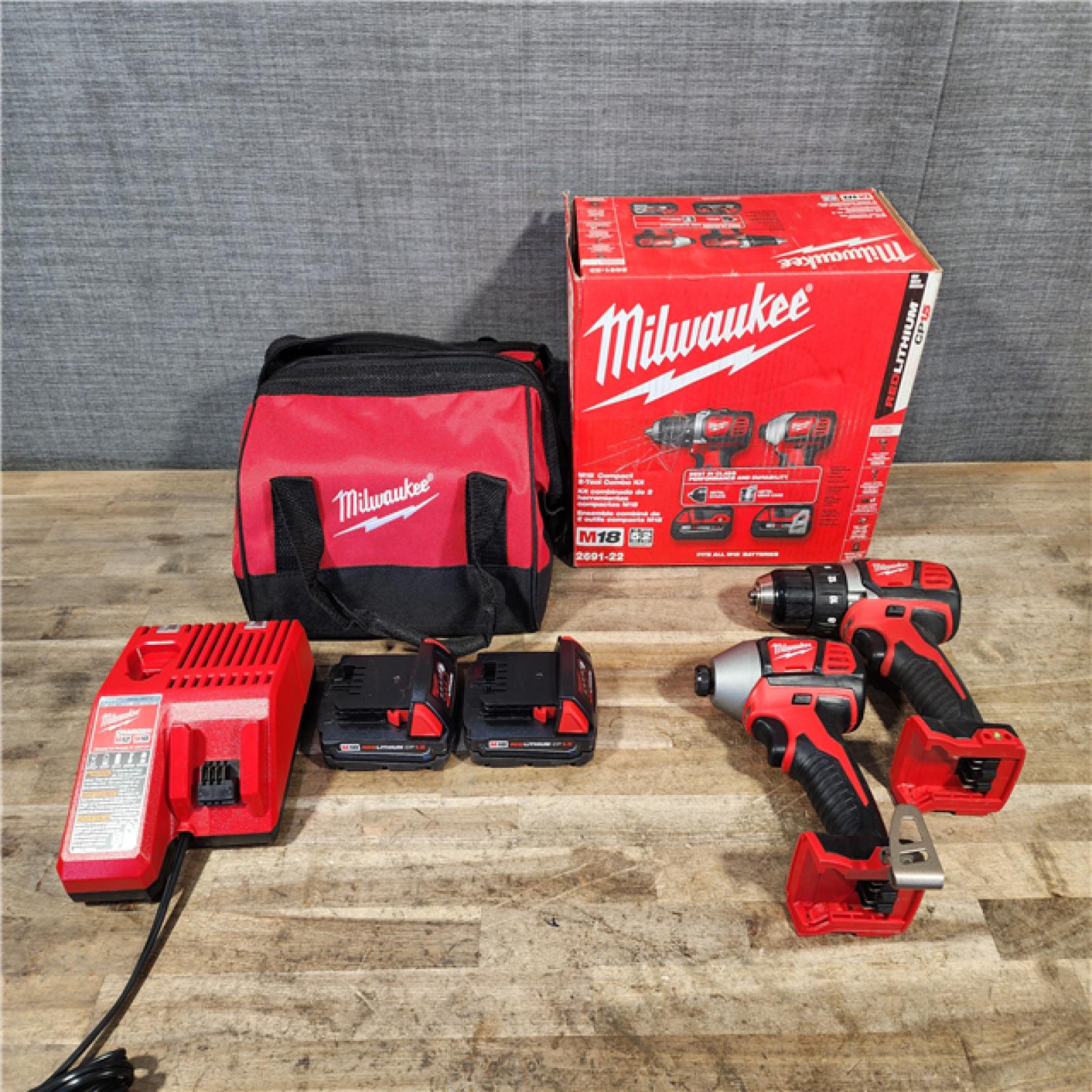 HOUSTON LOCATION - AS-IS Milwaukee M18 Brushed Cordless (2-Tool) Drill/Driver and Impact Driver Kit