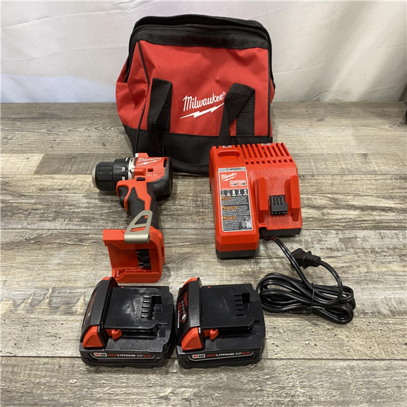 AS-IS Milwaukee 18V Lithium-Ion Brushless Cordless 1/2 in. Compact Hammer Drill/Driver Kit