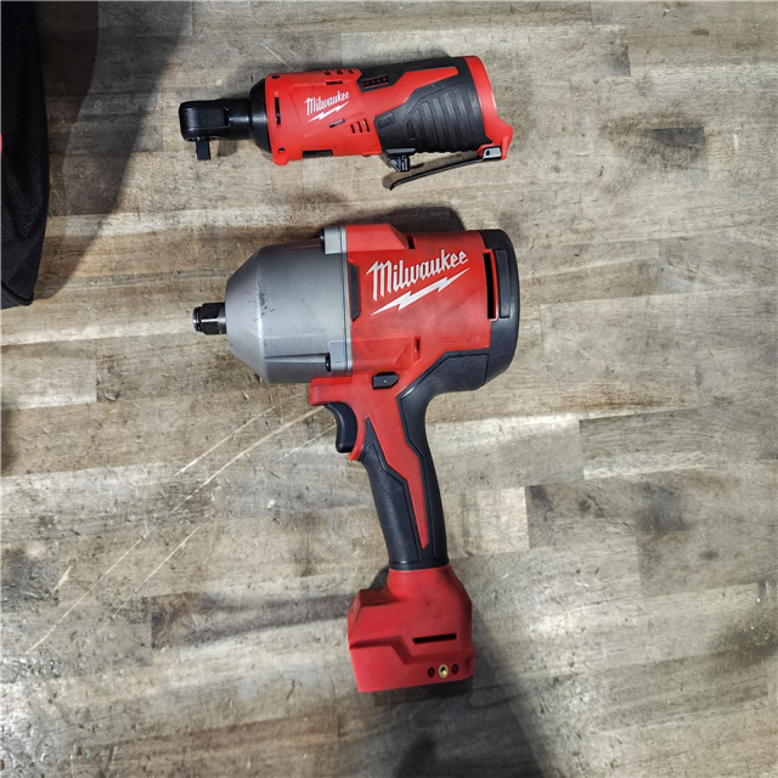 HOUSTON LOCATION - AS-IS Milwaukee M12/M18 12/18V Lithium-Ion Cordless 3/8 in. Ratchet and 1/2 in. High Torque Impact Wrench with Friction Ring Combo Kit