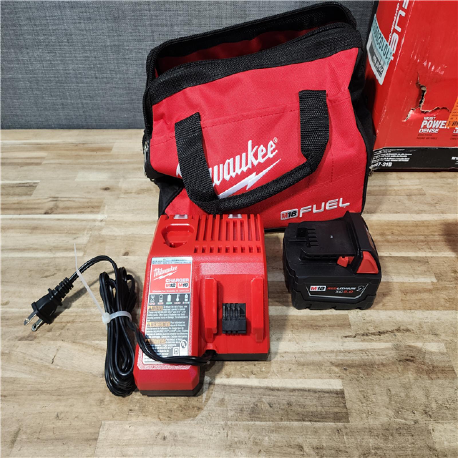 HOUSTON LOCATION - AS-IS (APPEARS LIKE NEW) Milwaukee FUEL 18V Lithium-Ion Brushless Cordless 1/2 in. Impact Wrench w/Friction Ring Kit