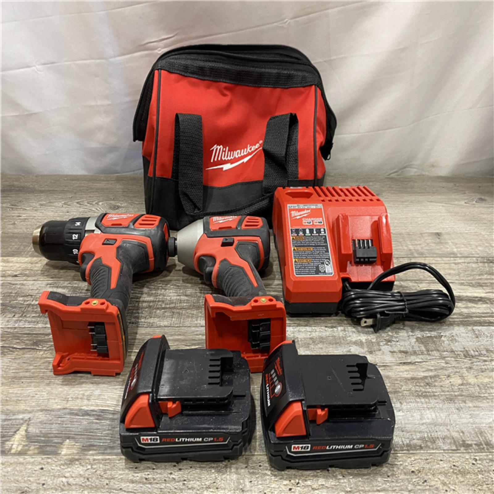 AS-IS Milwaukee 18V Lithium-Ion Cordless Drill Driver/Impact Driver Combo Kit