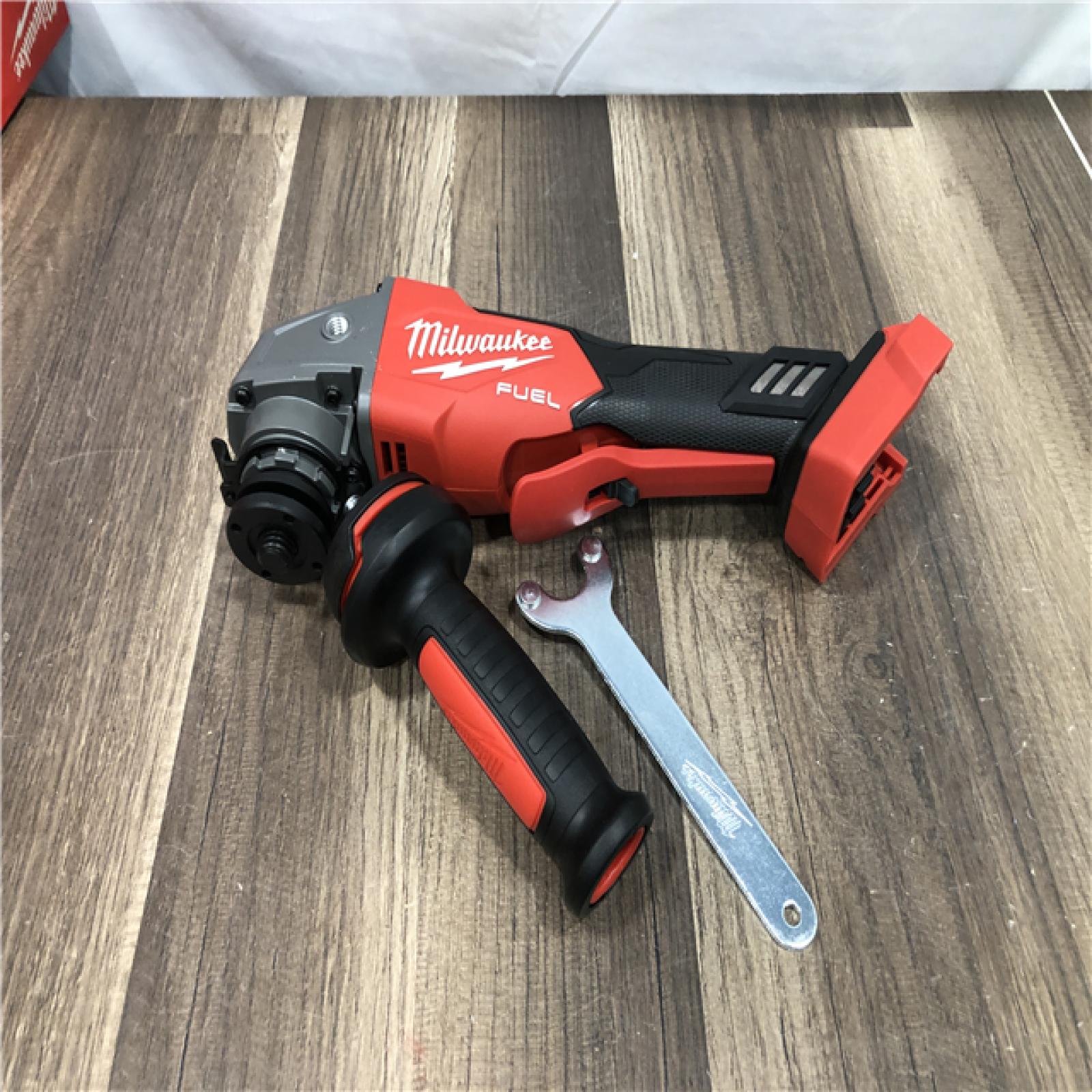 AS-IS Milwaukee FUEL 18V Lithium-Ion Brushless Cordless 4-1/2 in./5 in. Grinder w/Paddle Switch (Tool-Only)