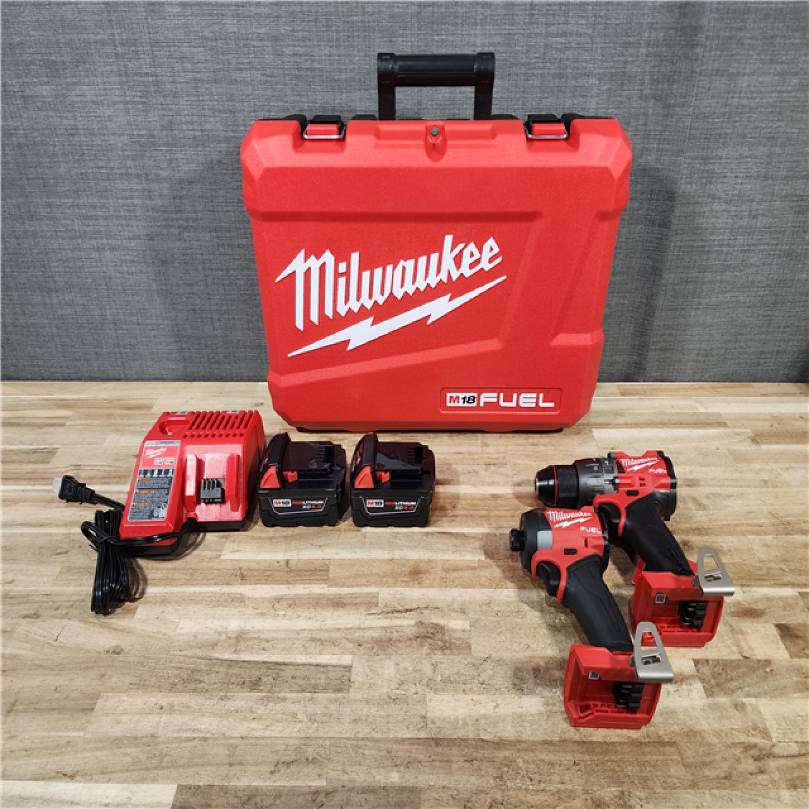 HOUSTON LOCATION - AS-IS (APPEARS LIKE NEW) Milwaukee FUEL 18V Lithium-Ion Brushless Cordless Hammer Drill and Impact Driver Combo Kit