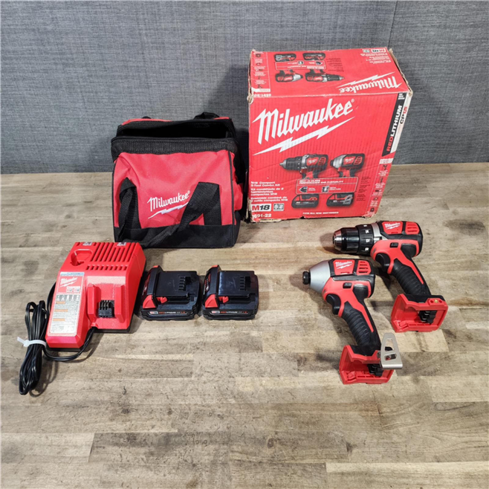 HOUSTON LOCATION - AS-IS Milwaukee 18V Cordless Brushed 2-Tool Drill/Driver and Impact Driver Kit