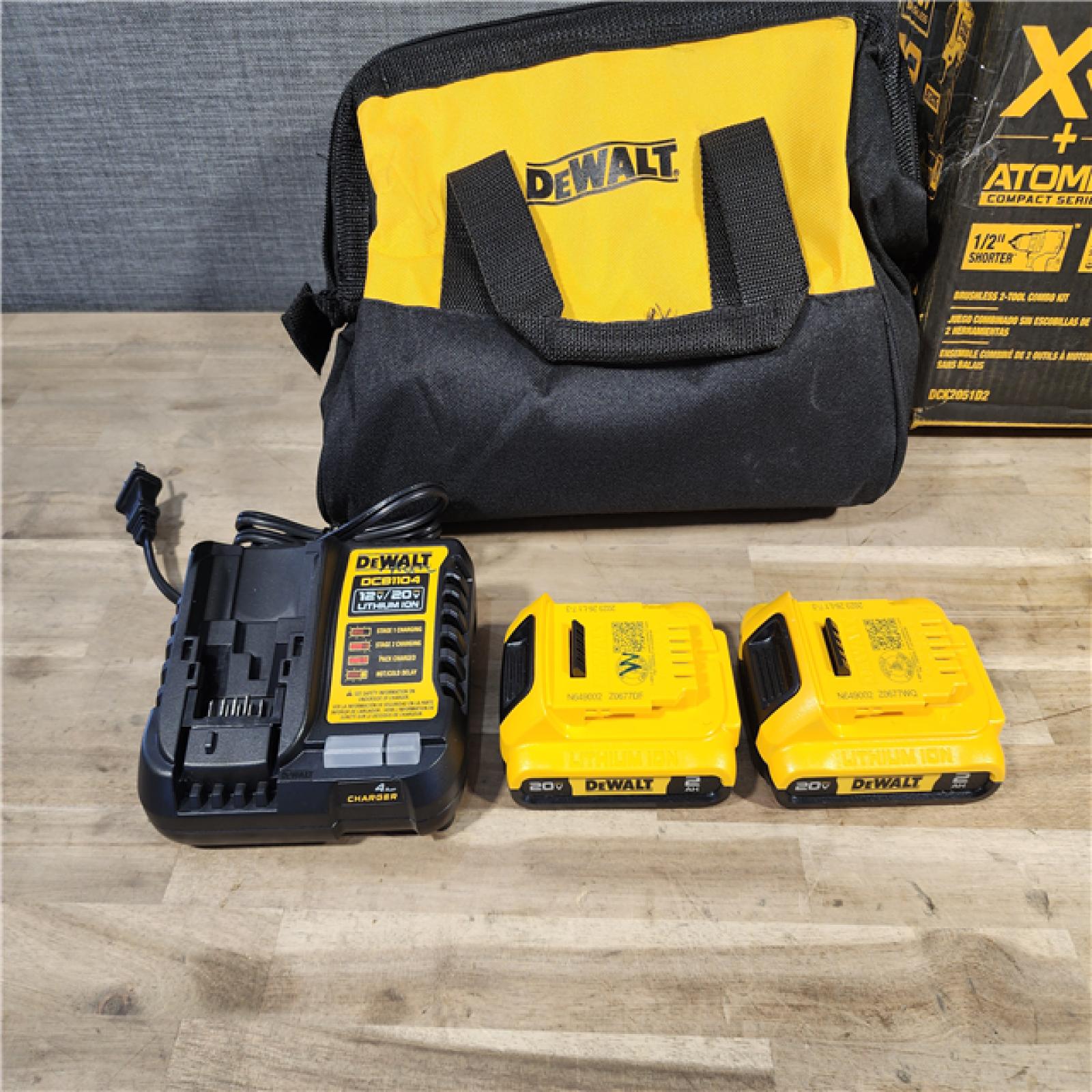 HOUSTON LOCATION - AS-IS DEWALT 20V MAX XR Cordless Drill/Driver, ATOMIC Impact Driver 2 Tool Combo Kit, (2) 2.0Ah Batteries, Charger, and Bag