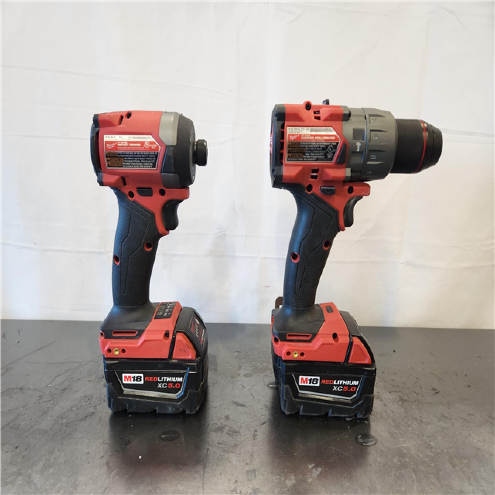 AS-IS- Milwaukee FUEL 18V Lithium-Ion Brushless Cordless Hammer Drill and Impact Driver Combo Kit