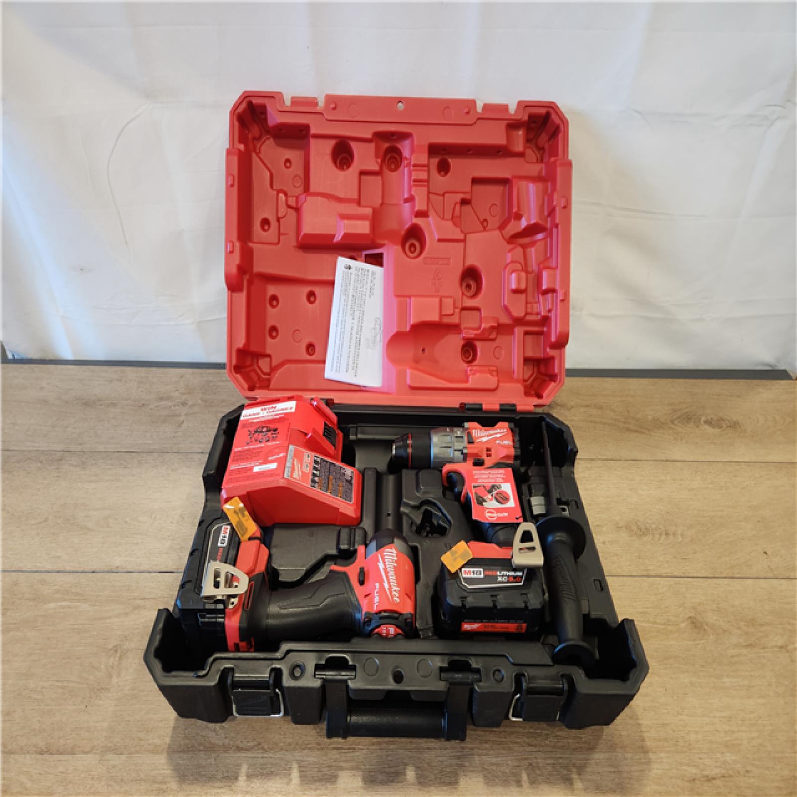 AS-IS- Milwaukee FUEL 18V Lithium-Ion Brushless Cordless Hammer Drill and Impact Driver Combo Kit