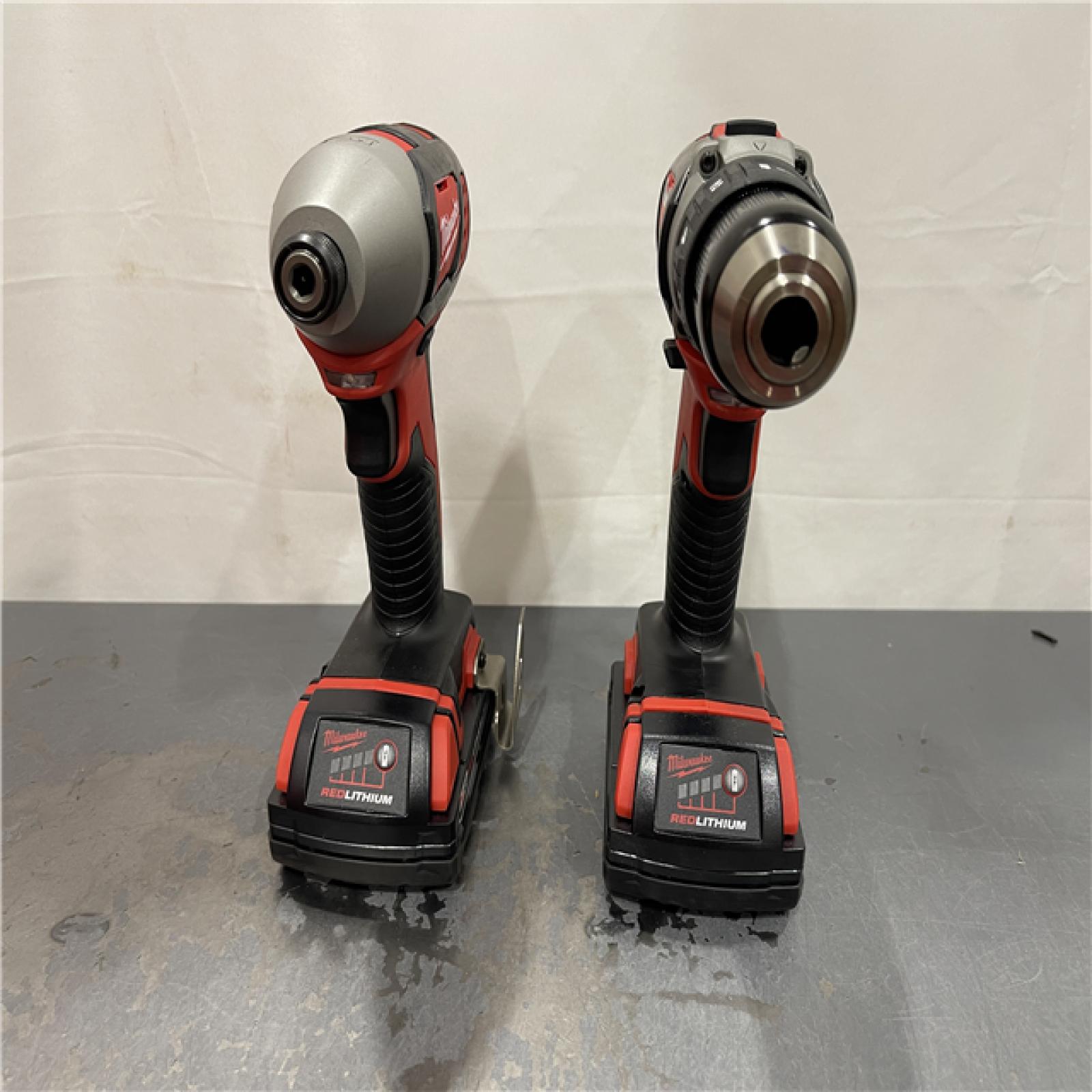 AS-IS - Milwaukee M18 18V Lithium-Ion Cordless Drill Driver/Impact Driver Combo Kit (2-Tool)