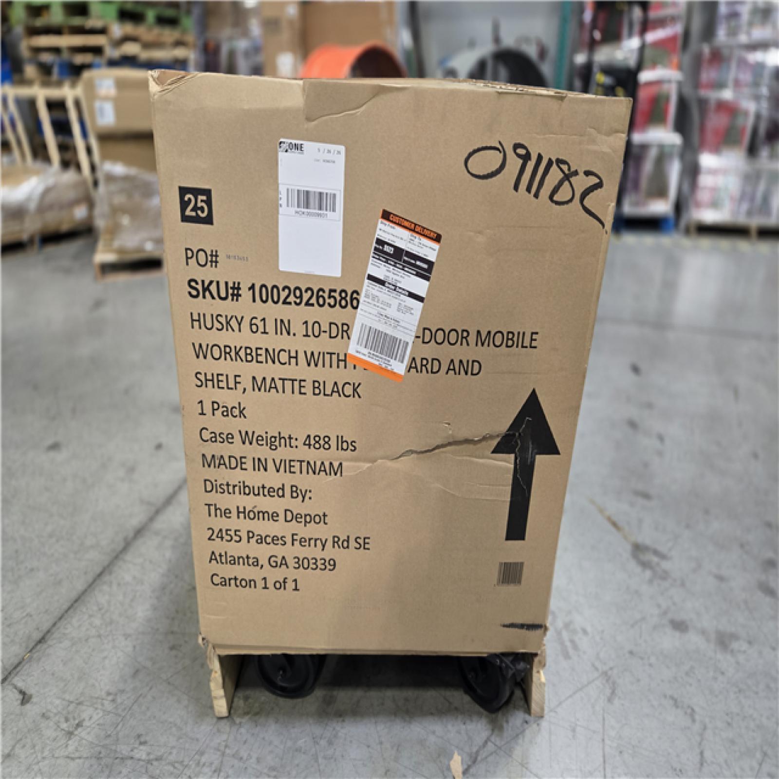 DALLAS LOCATION - AS-IS Husky 61 in. W x 26 in. D Heavy Duty 10-Drawer 1-Door Mobile Workbench with Hardwood Top  Pegboard and Shelf in Matte Black