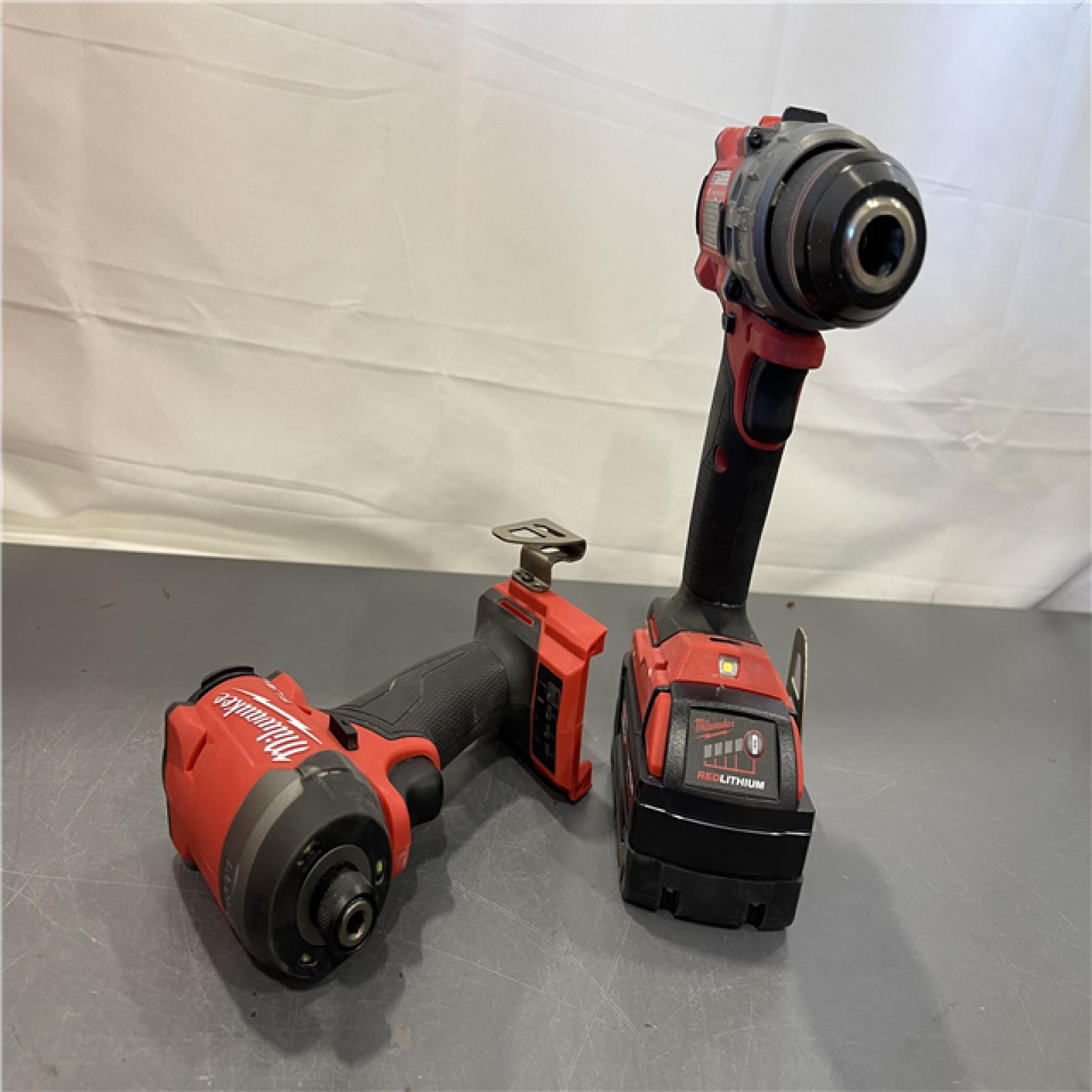 AS-IS - MILWAUKEE FUEL 18V Lithium-Ion Brushless Cordless Hammer Drill and Impact Driver Combo Kit