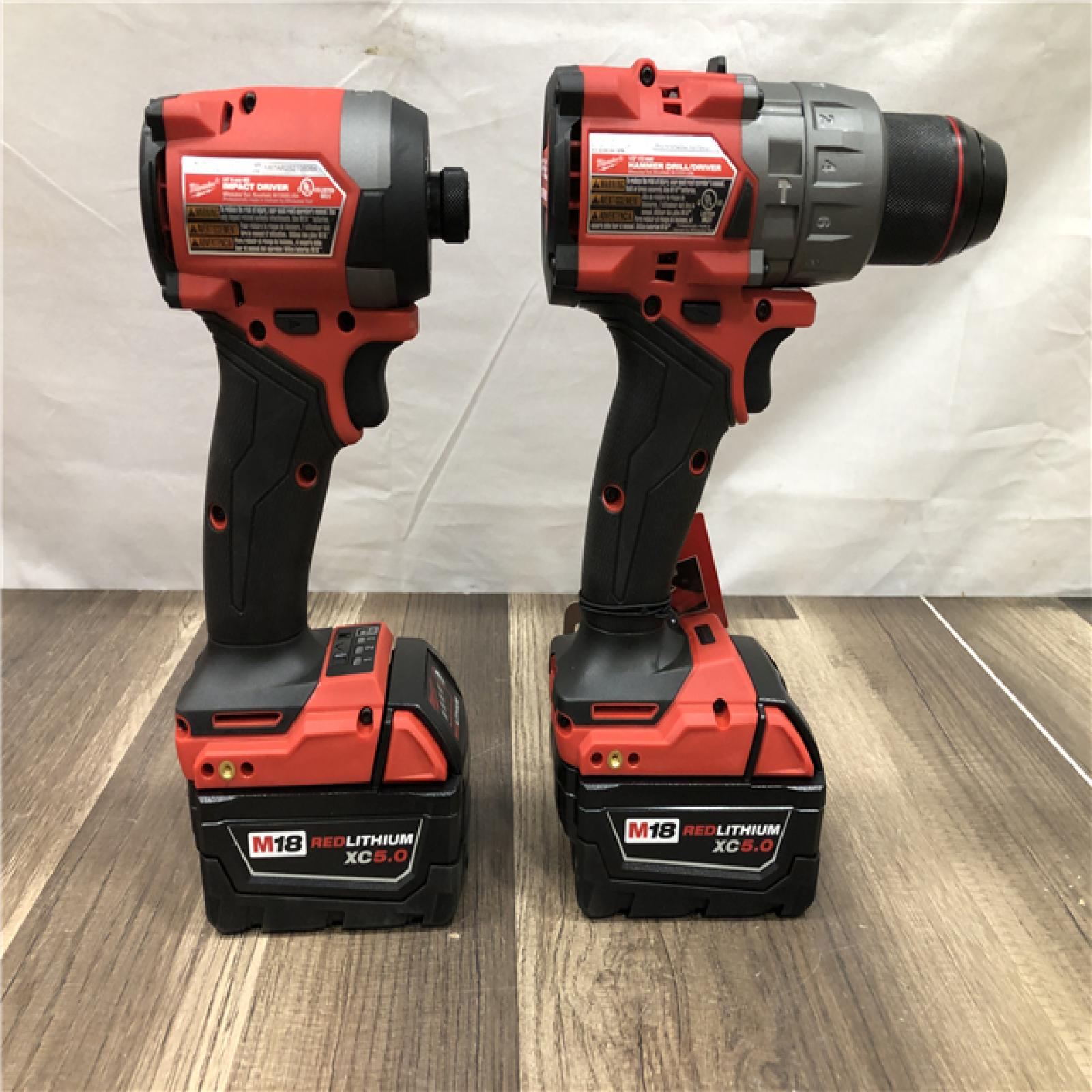 AS-IS Milwaukee FUEL 18V Lithium-Ion Brushless Cordless Hammer Drill and Impact Driver Combo Kit