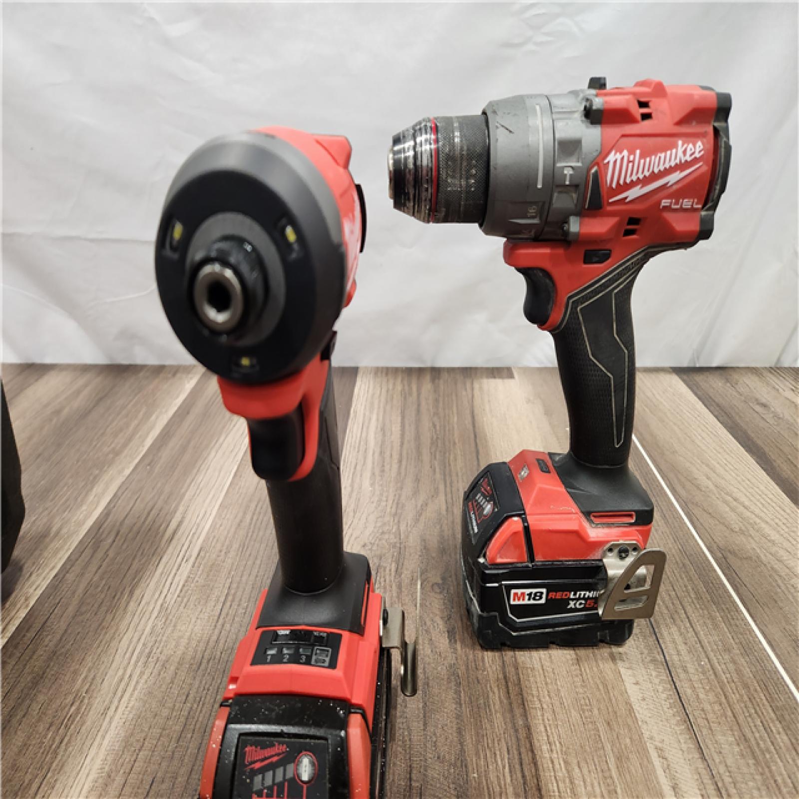 AS-IS  Milwaukee M18 FUEL 18V Lithium-Ion Brushless Cordless Hammer Drill and Impact Driver Combo Kit (2-Tool) with 2 Batteries