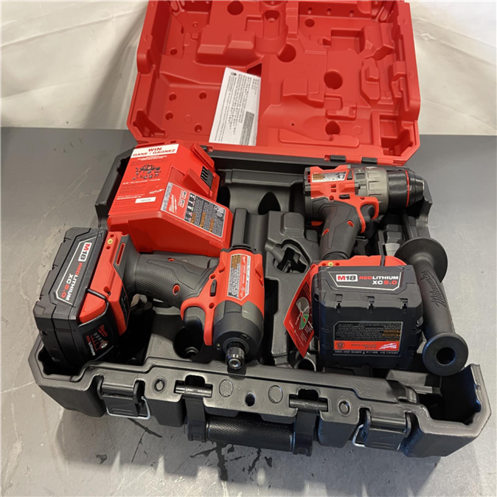 AS-IS - Milwaukee M18 FUEL 18V Lithium-Ion Brushless Cordless Hammer Drill and Impact Driver Combo Kit