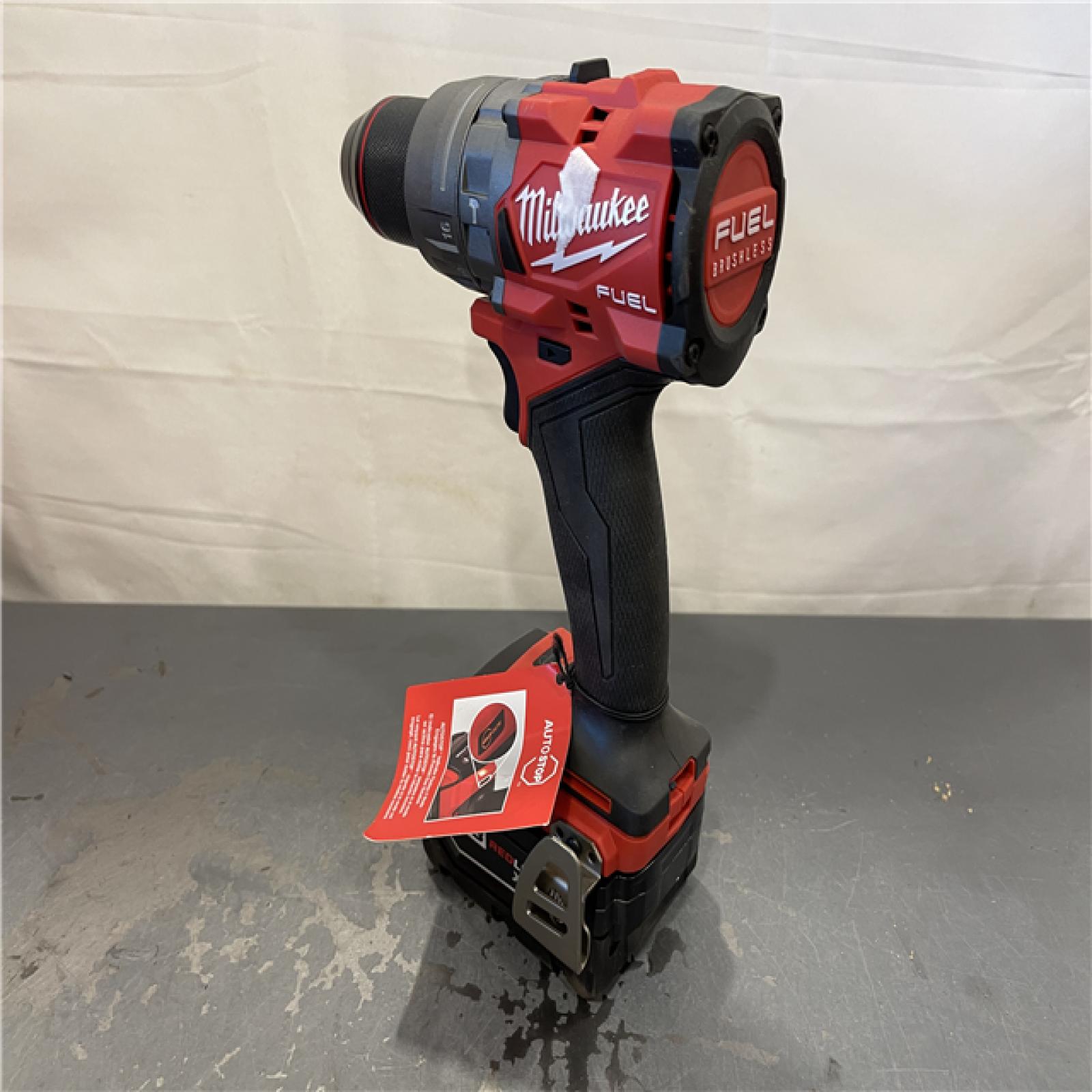 AS-IS - Milwaukee M18 FUEL 18V Lith-Ion Brushless Cordless 1/2 in. Hammer Drill/Driver w/ 5.0 Ah Battery