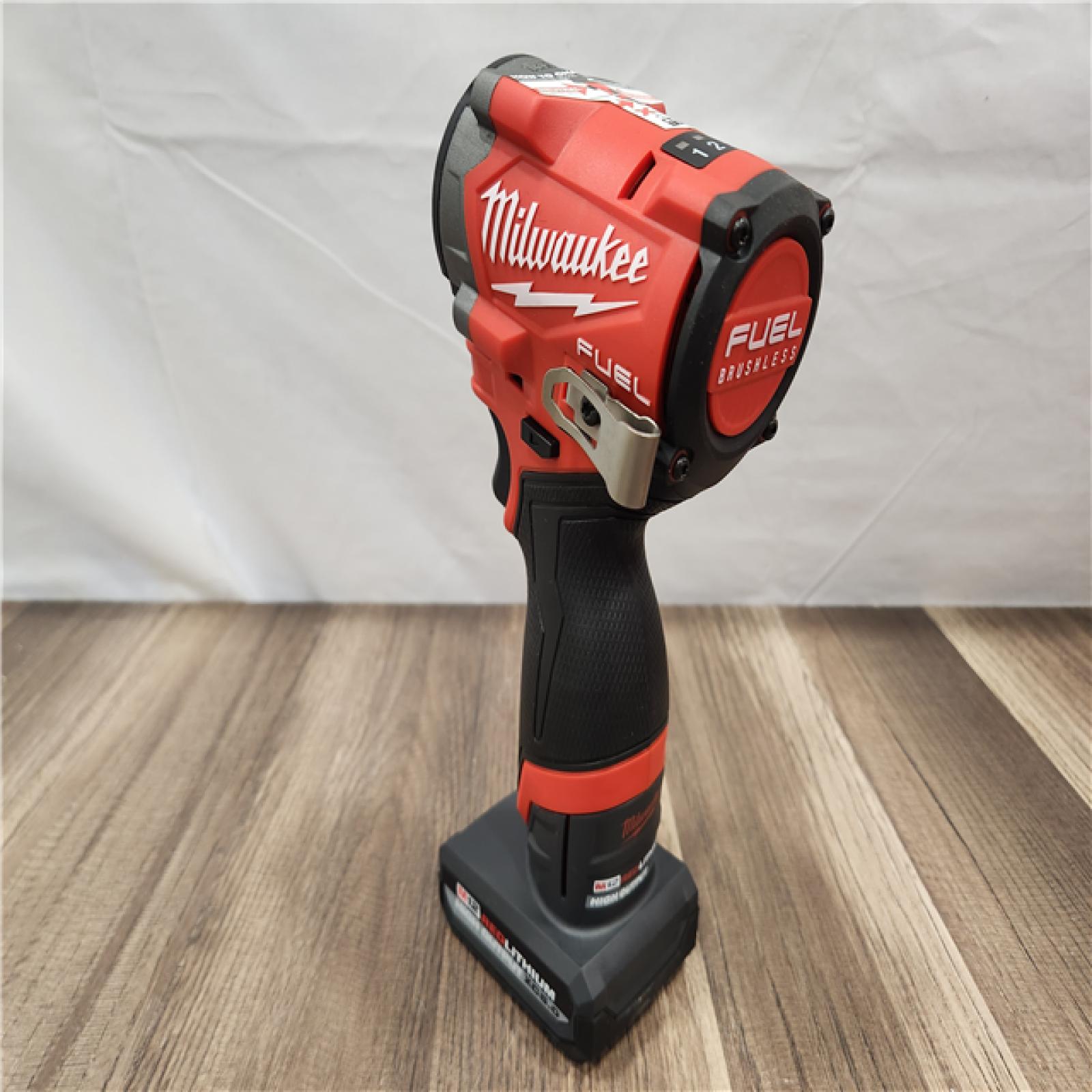 AS-IS- Milwaukee M12 FUEL 12V Li-Ion Brushless Cordless Stubby 3/8 in. Impact Wrench Kit W/(1) 5.0 Ah High Output Battery