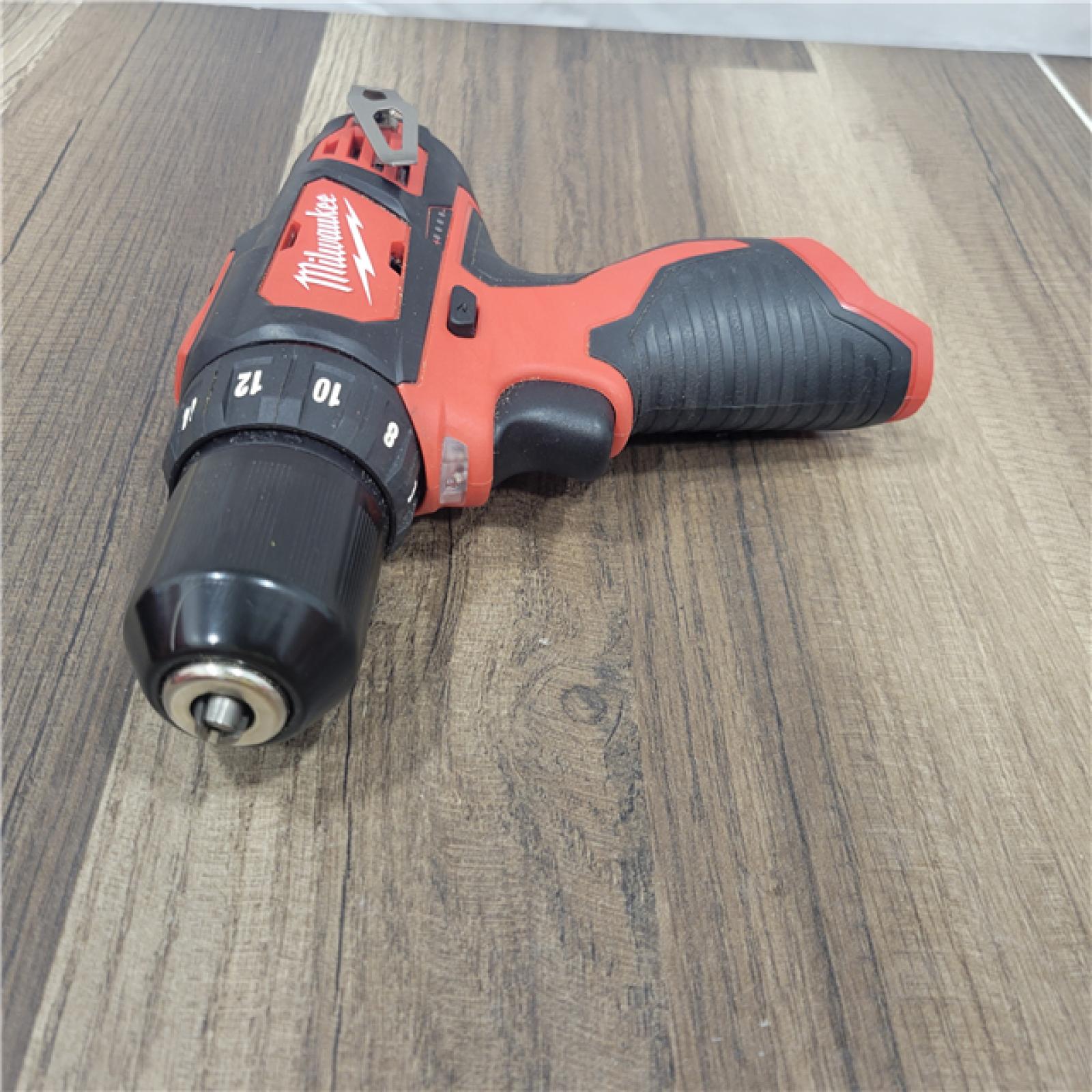 AS-IS MILWAUKEE M12 12V Lithium-Ion Cordless 3/8 in. Drill/Driver Kit with Two 1.5 Ah Batteries, Charger and Tool Bag