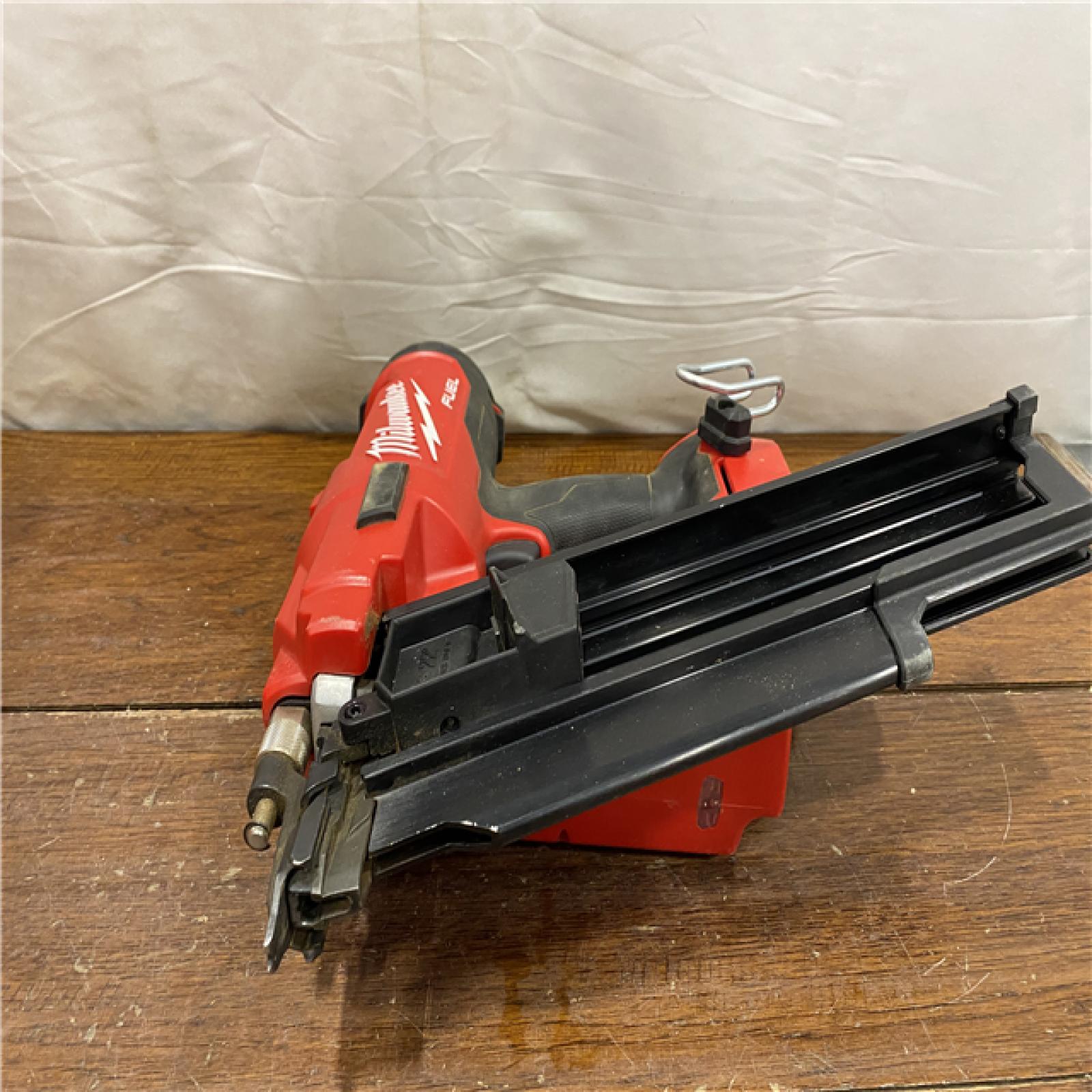AS-IS Milwaukee 2744-20 M18 FUEL 3-1/2 in. 18-Volt 21-Degree Lithium-Ion Brushless Cordless Framing Nailer (Tool-Only)
